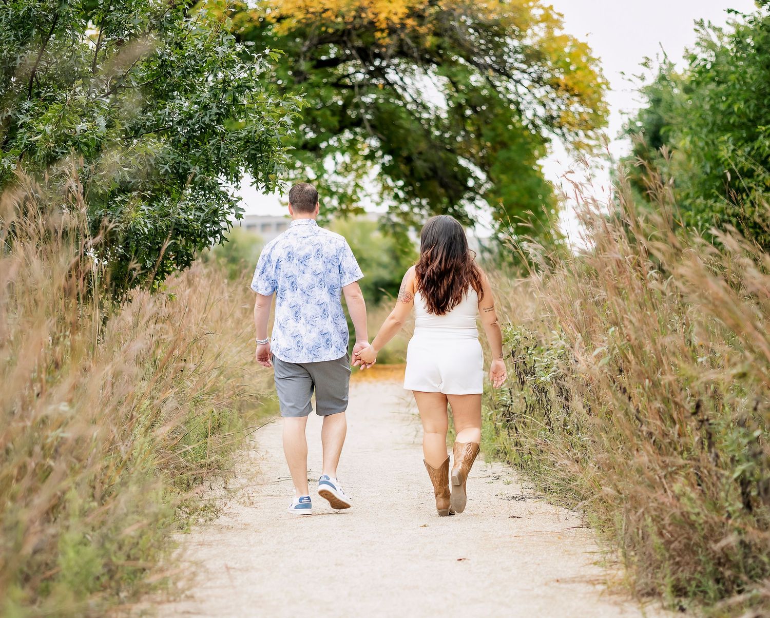 Couple holding hand walking