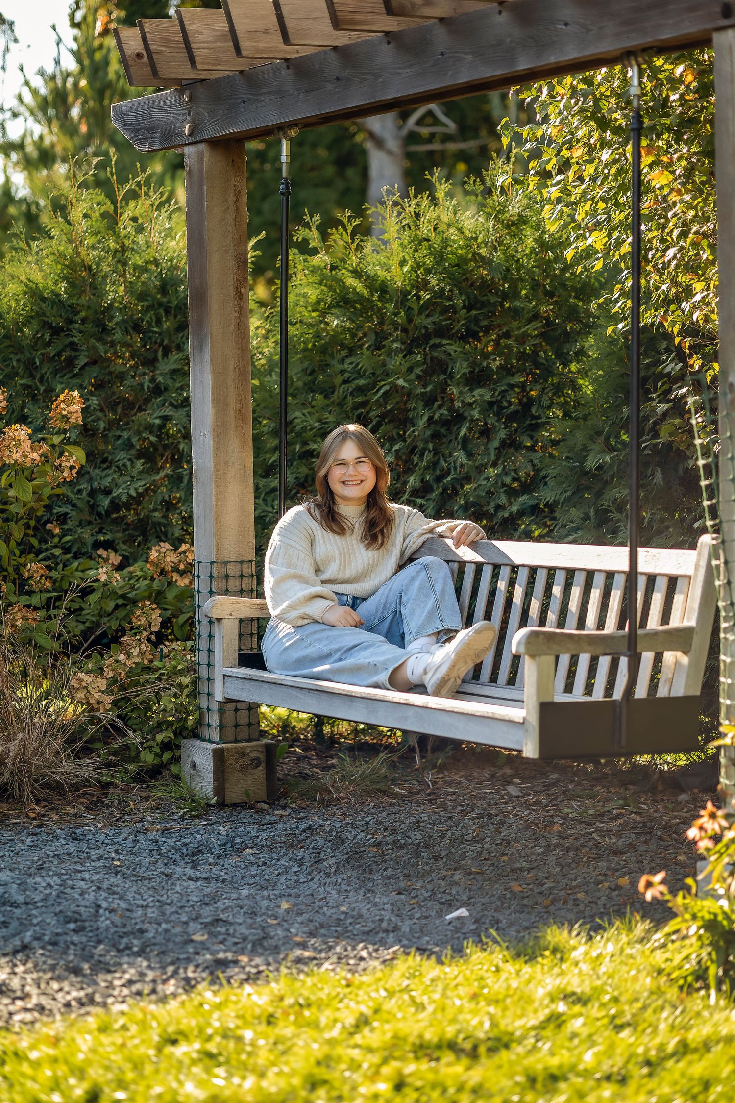Senior girl relaxing on a bench