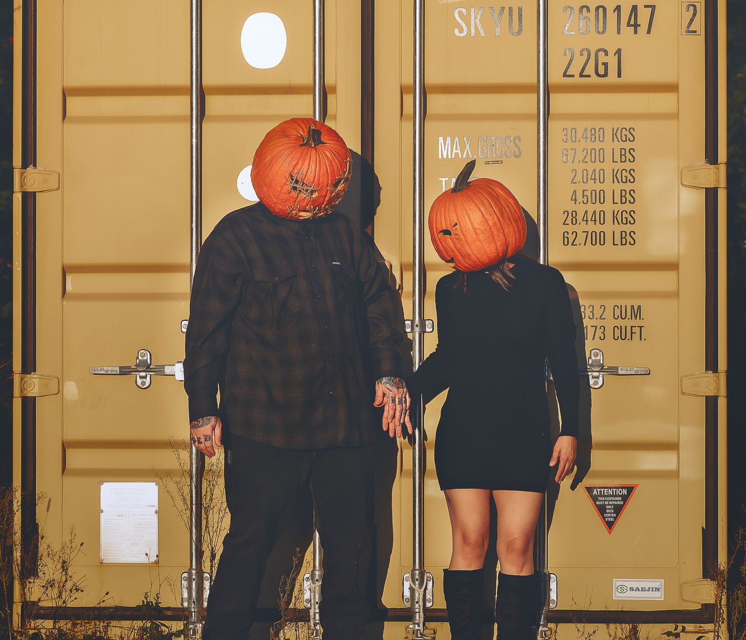 couple looking at each other and holding hands, looking at each other