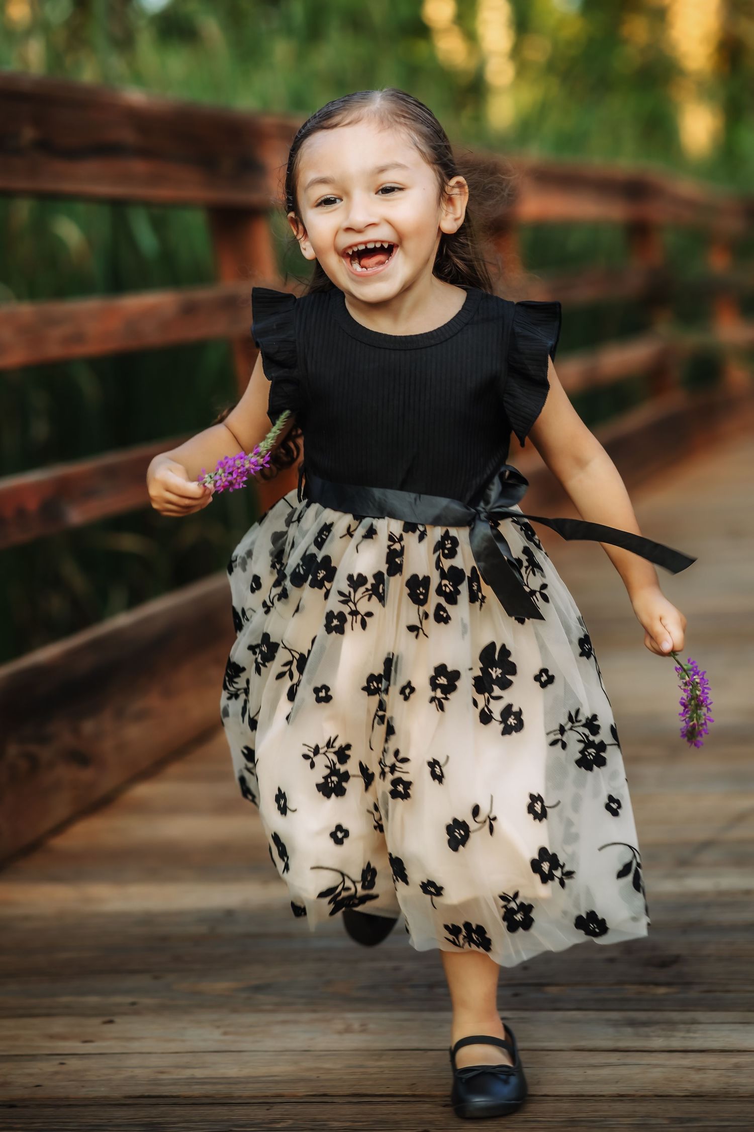 Little girl running towards Cass