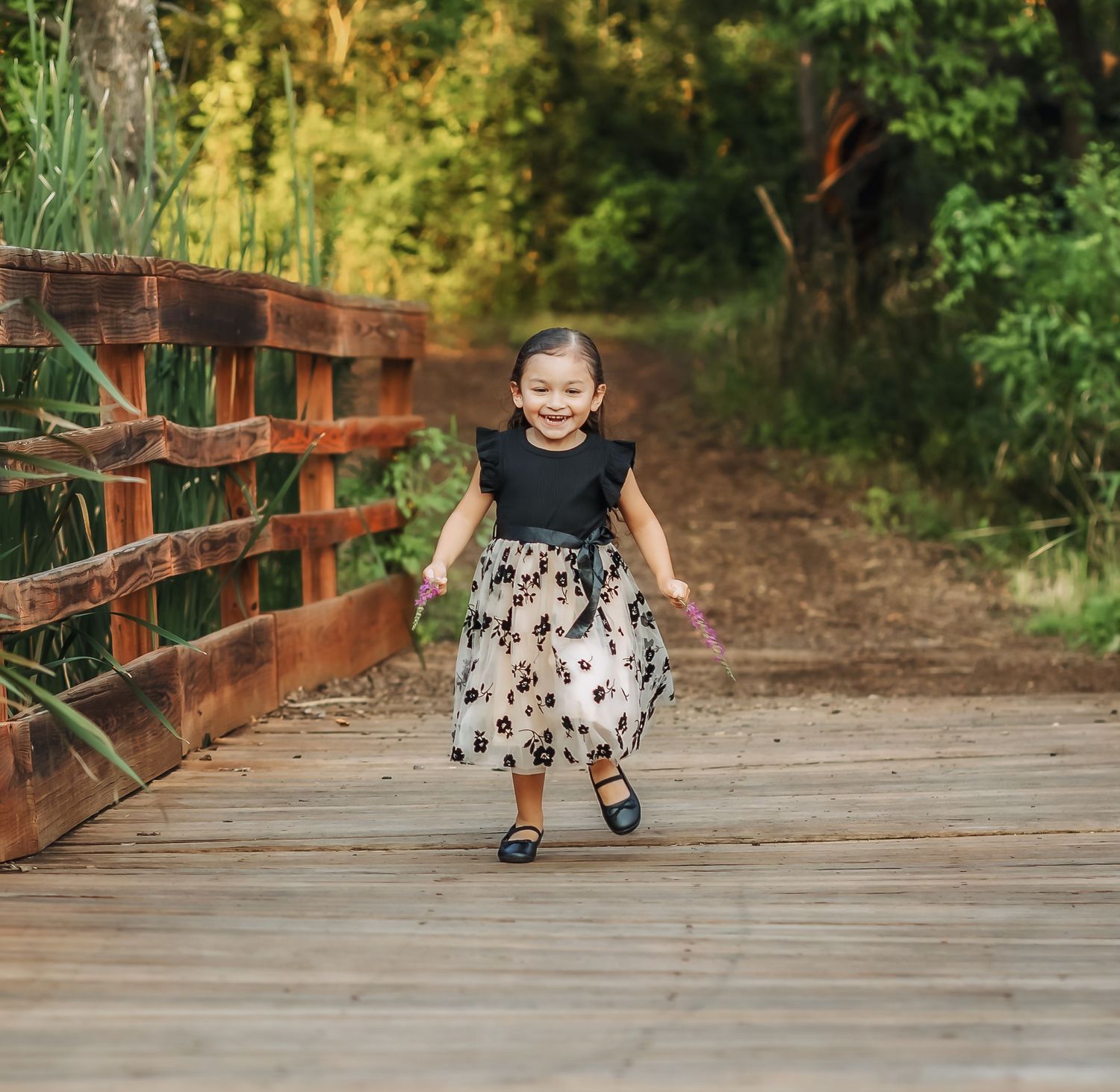 Little girl running towards the camera