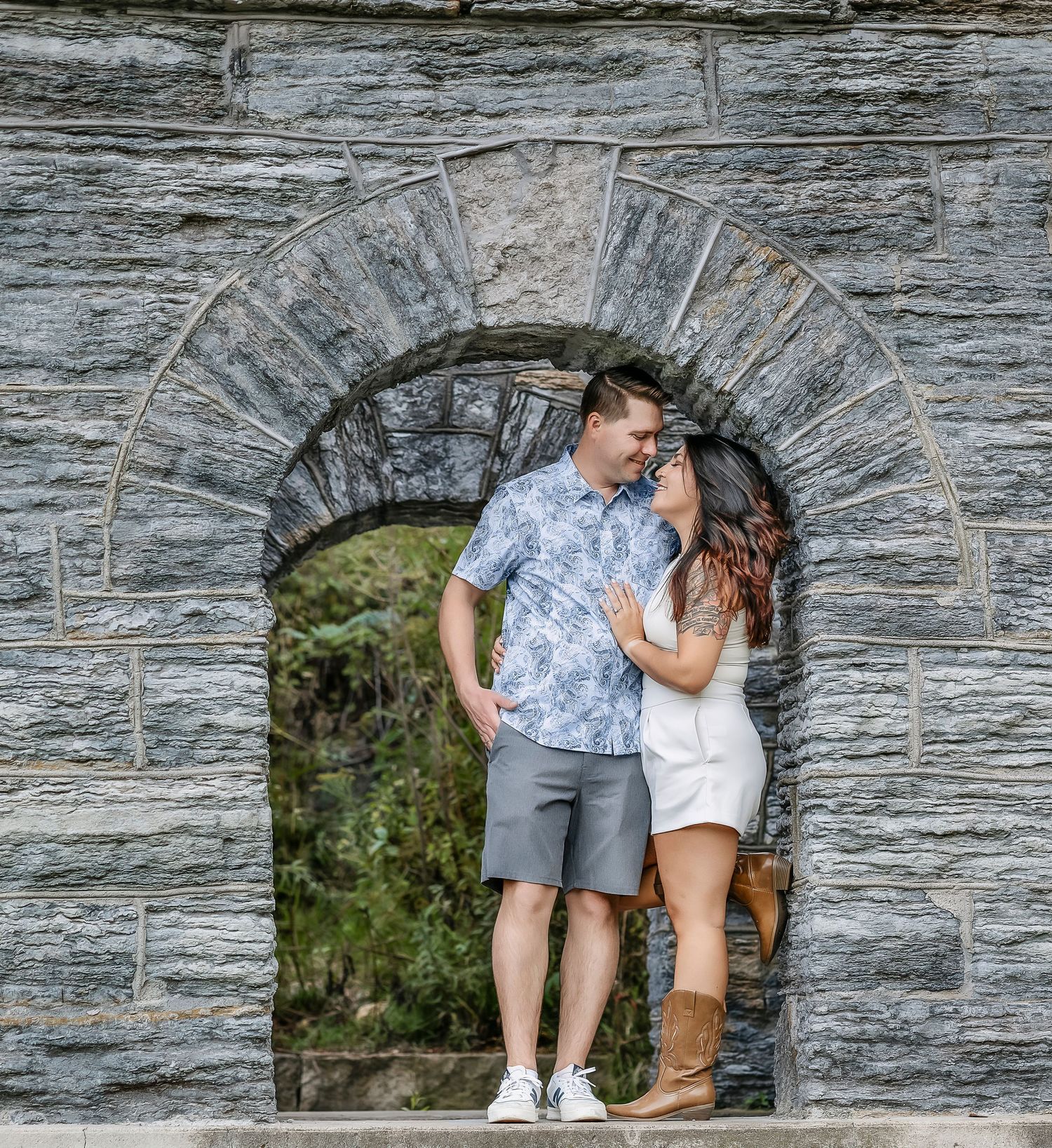 Couple together in a stone arch
