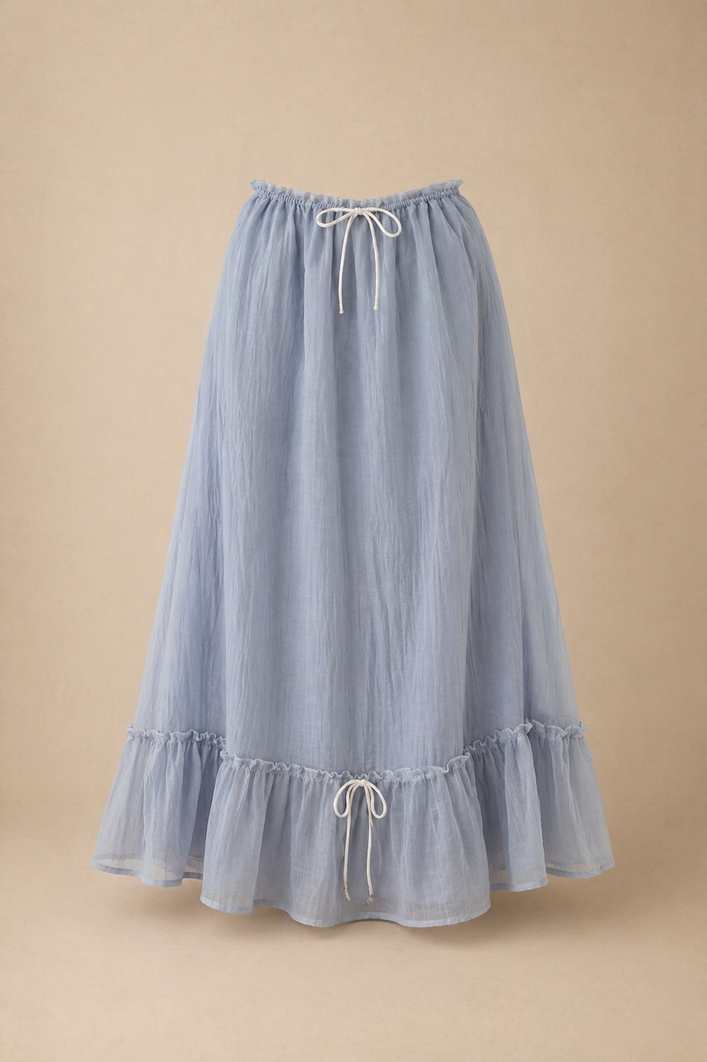 Light blue maxi skirt with drawstring waist, ruffled hem, and crinkle texture fabric.