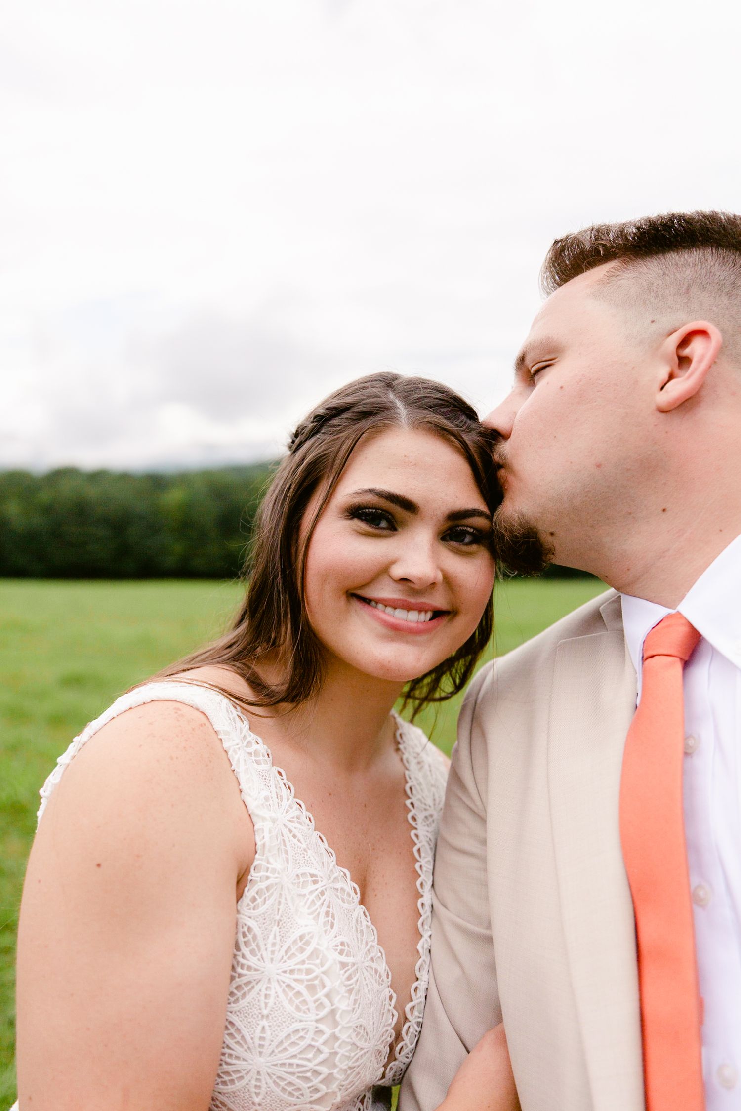 Series of intimate close-up shots of a couple in wedding attire sharing tender moments outdoors.