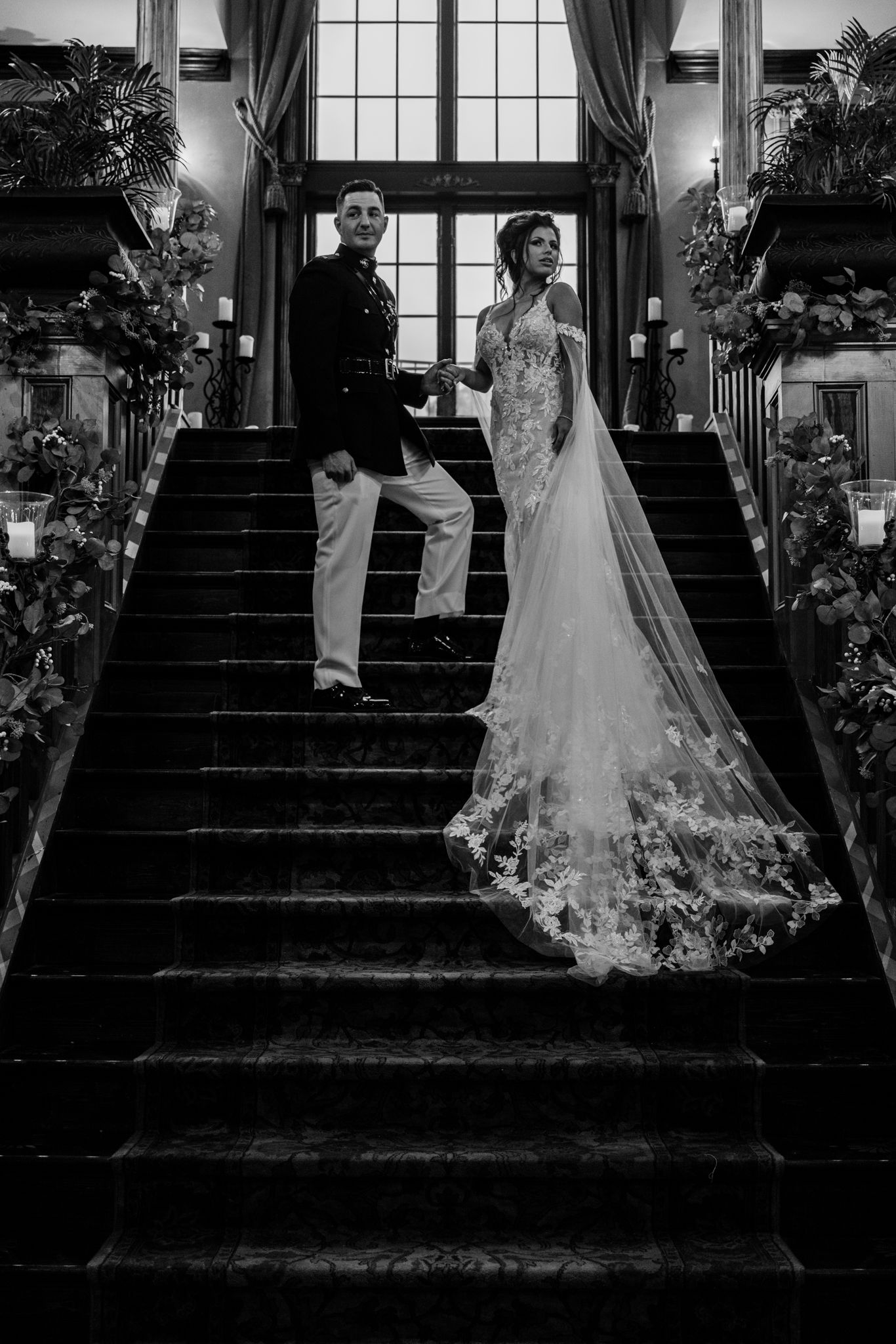 A series of black and white photographs showing a wedding dress on a grand staircase with dramatic window lighting.