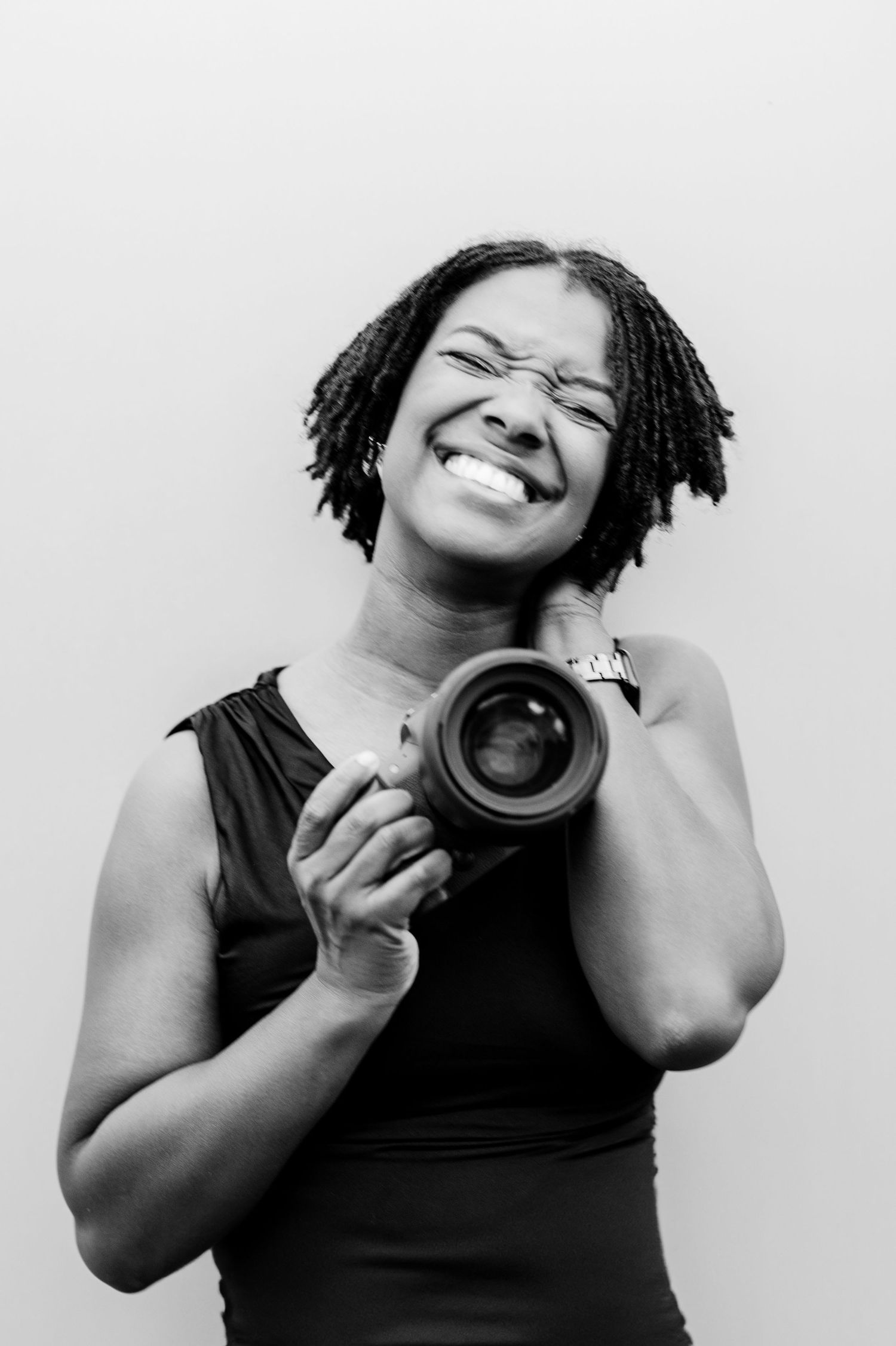 A black and white photo series shows expressions of joy and laughter while wearing headphones.