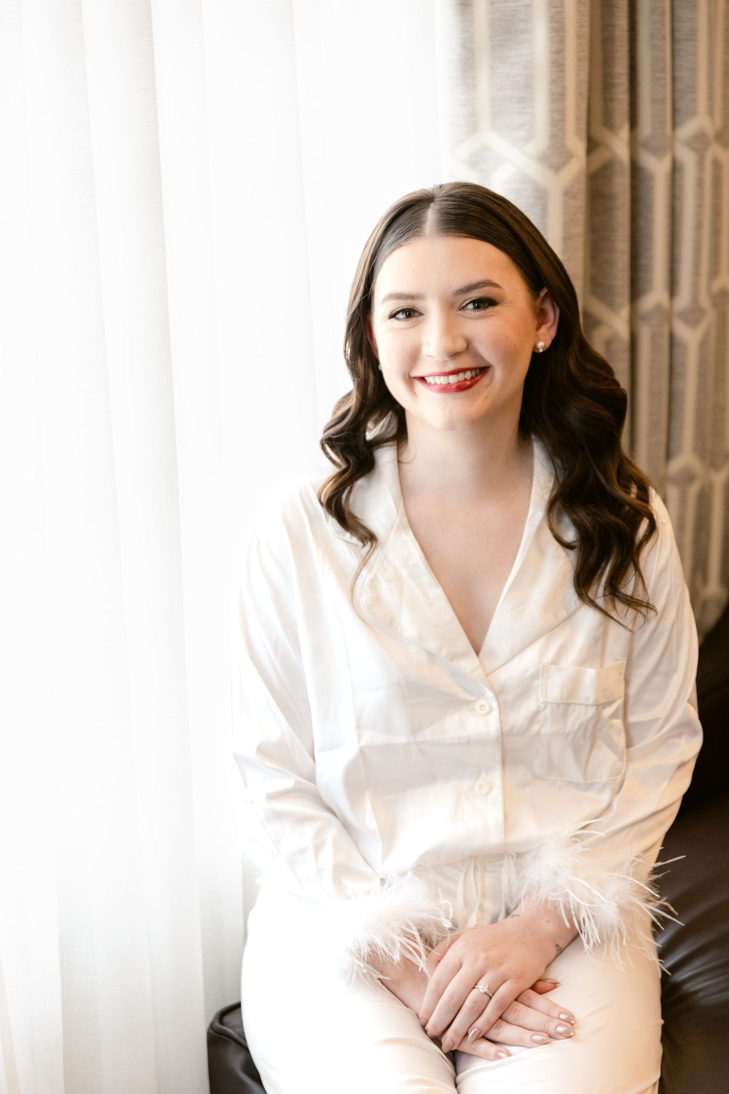A series of five boudoir portraits showing a person in a white satin robe against a light background.