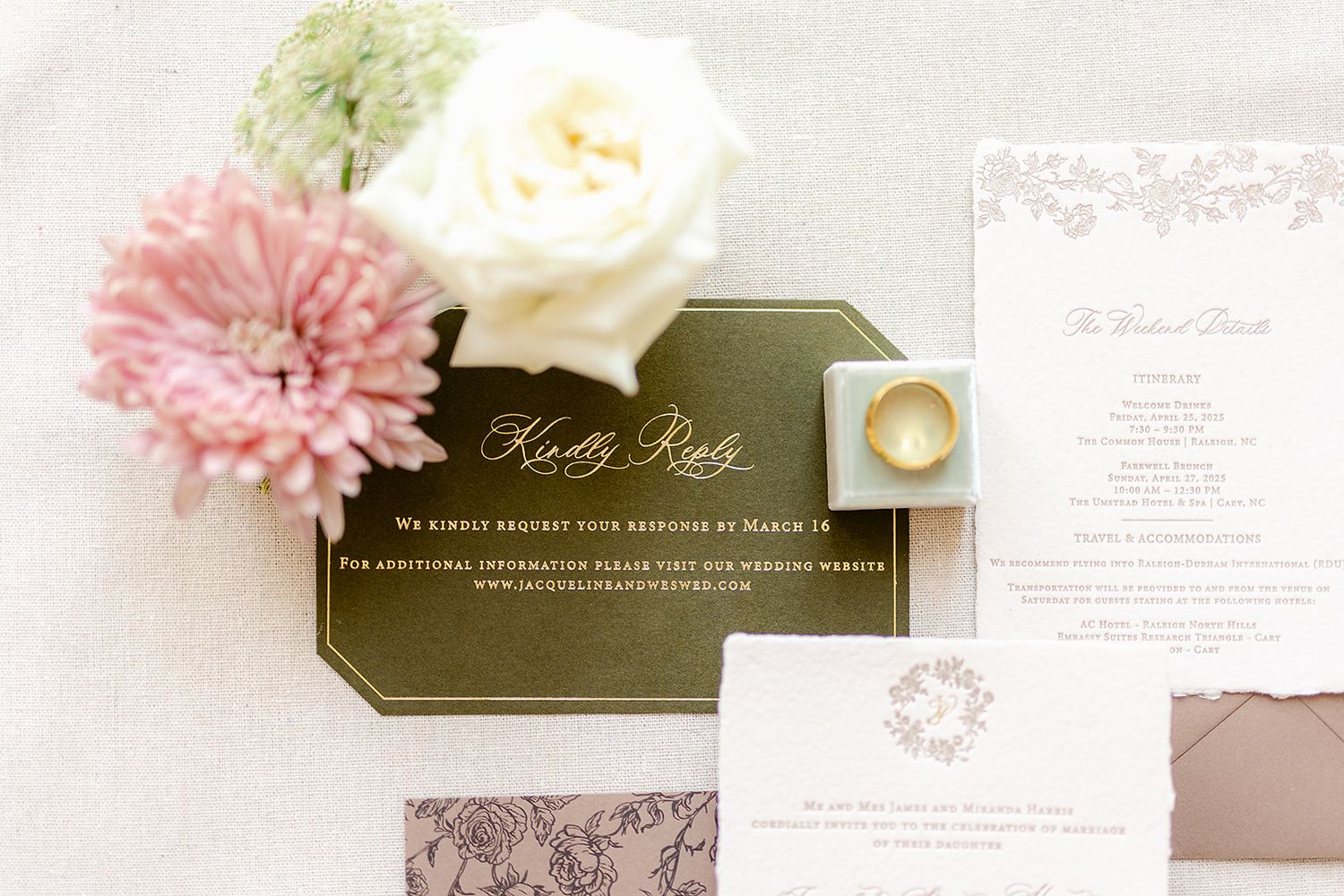 Elegant wedding invitation suite in blush pink and white with floral accents and delicate calligraphy details.