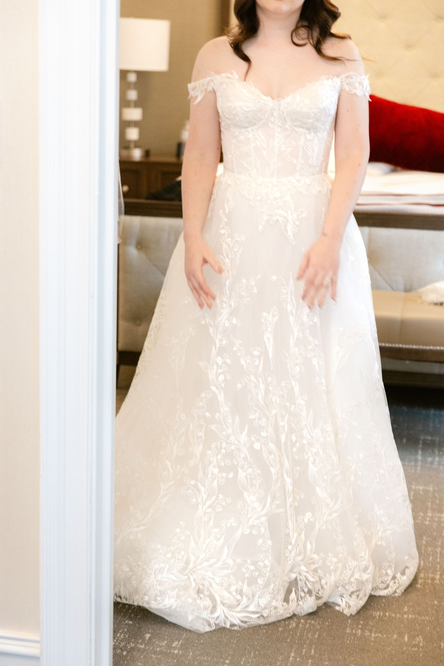 White lace wedding dress with delicate embroidery details and cap sleeves shown in multiple views.