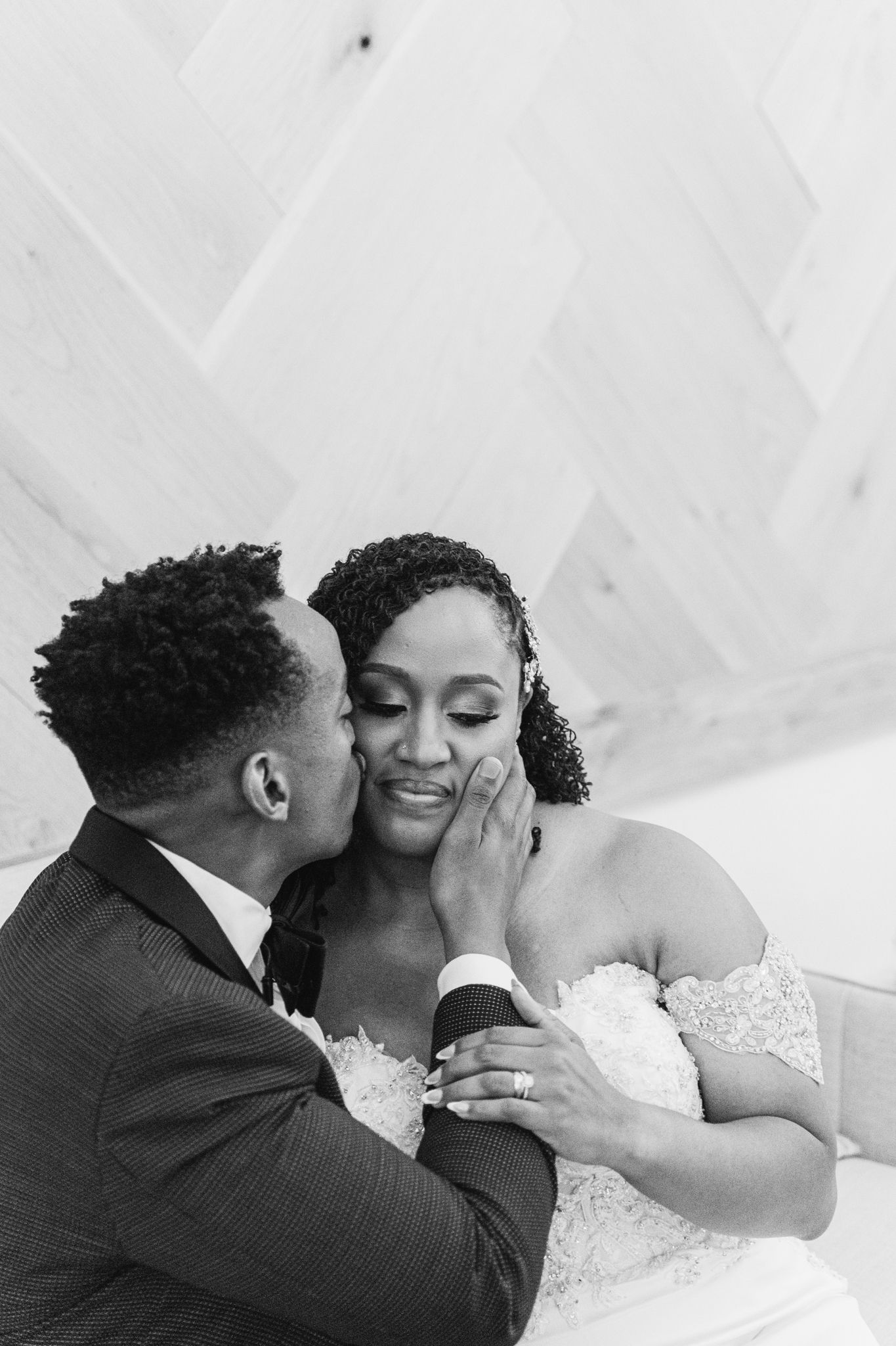 A romantic black and white photo sequence shows a tender moment between newlyweds sharing kisses.