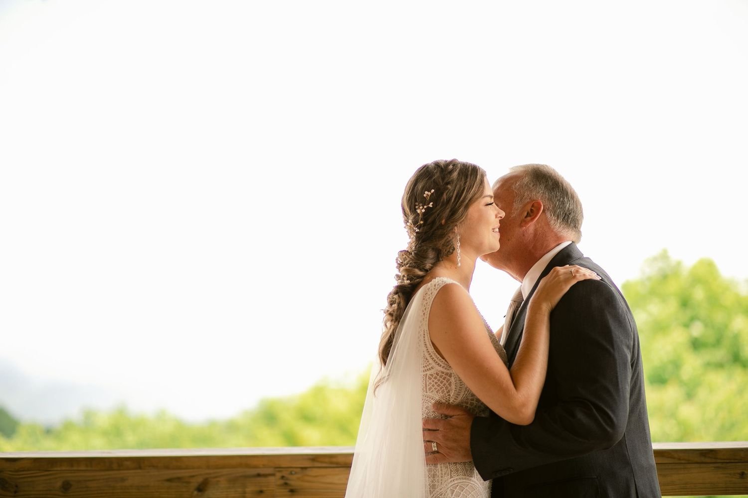 A tender moment between a couple during their wedding celebration.