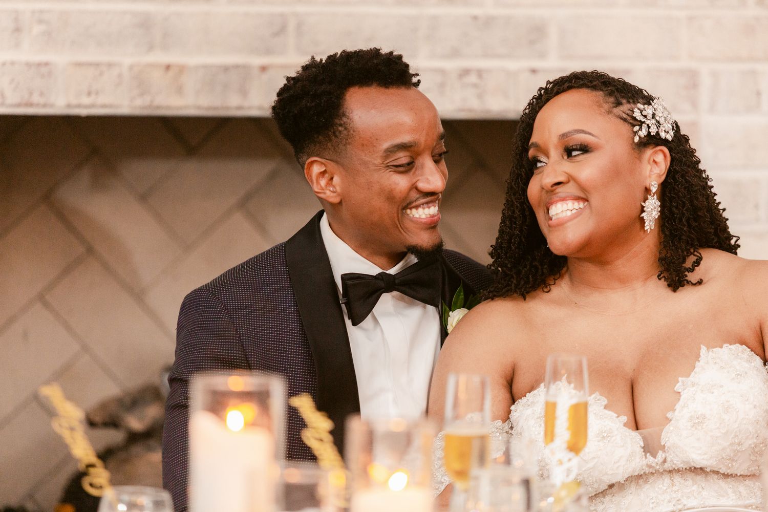 Romantic wedding reception scene with couples sharing intimate moments at an elegant venue.