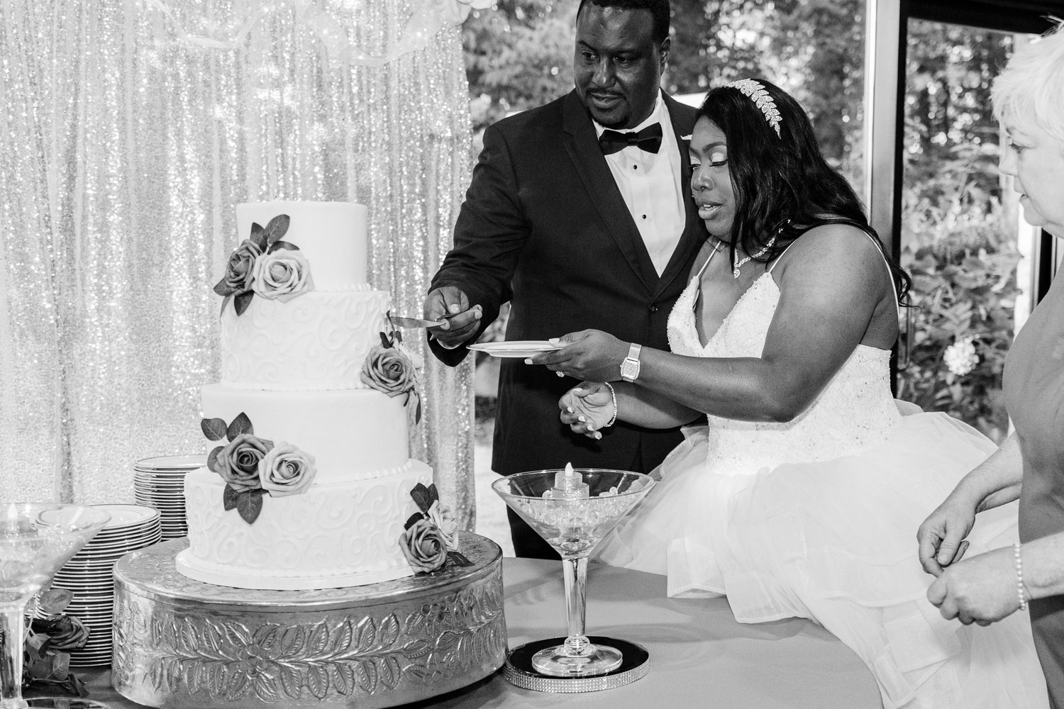 Candid cake cutting captured in documentary style at Greensboro NC wedding