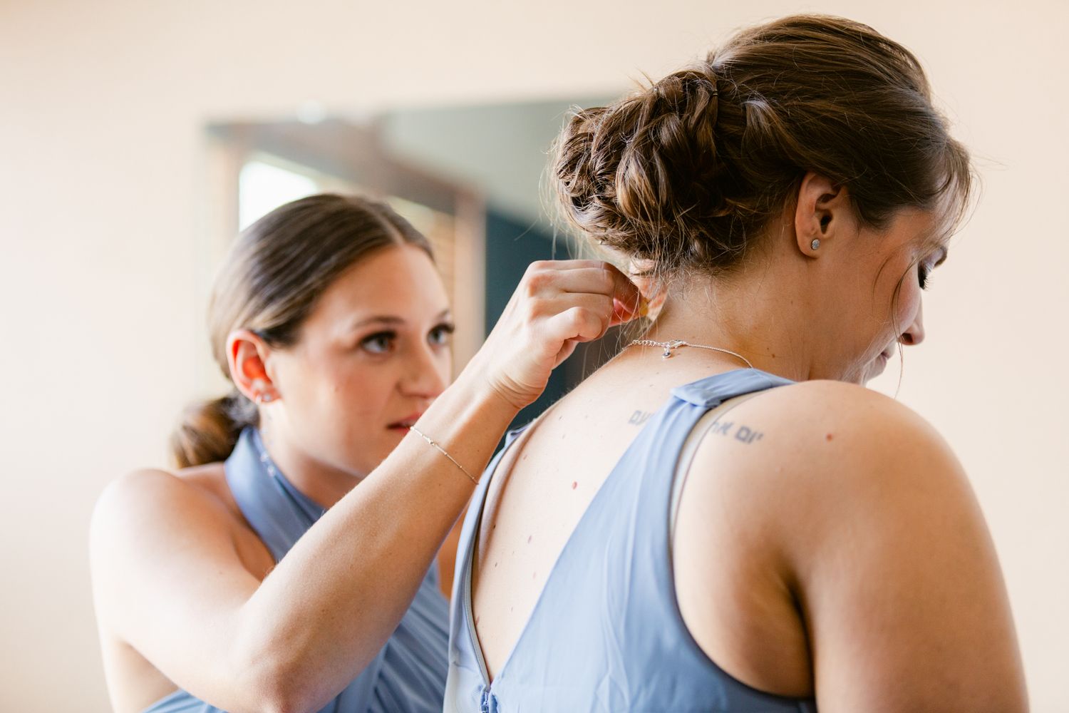 A sequence of intimate dance poses showing two dancers in close embrace during a performance.