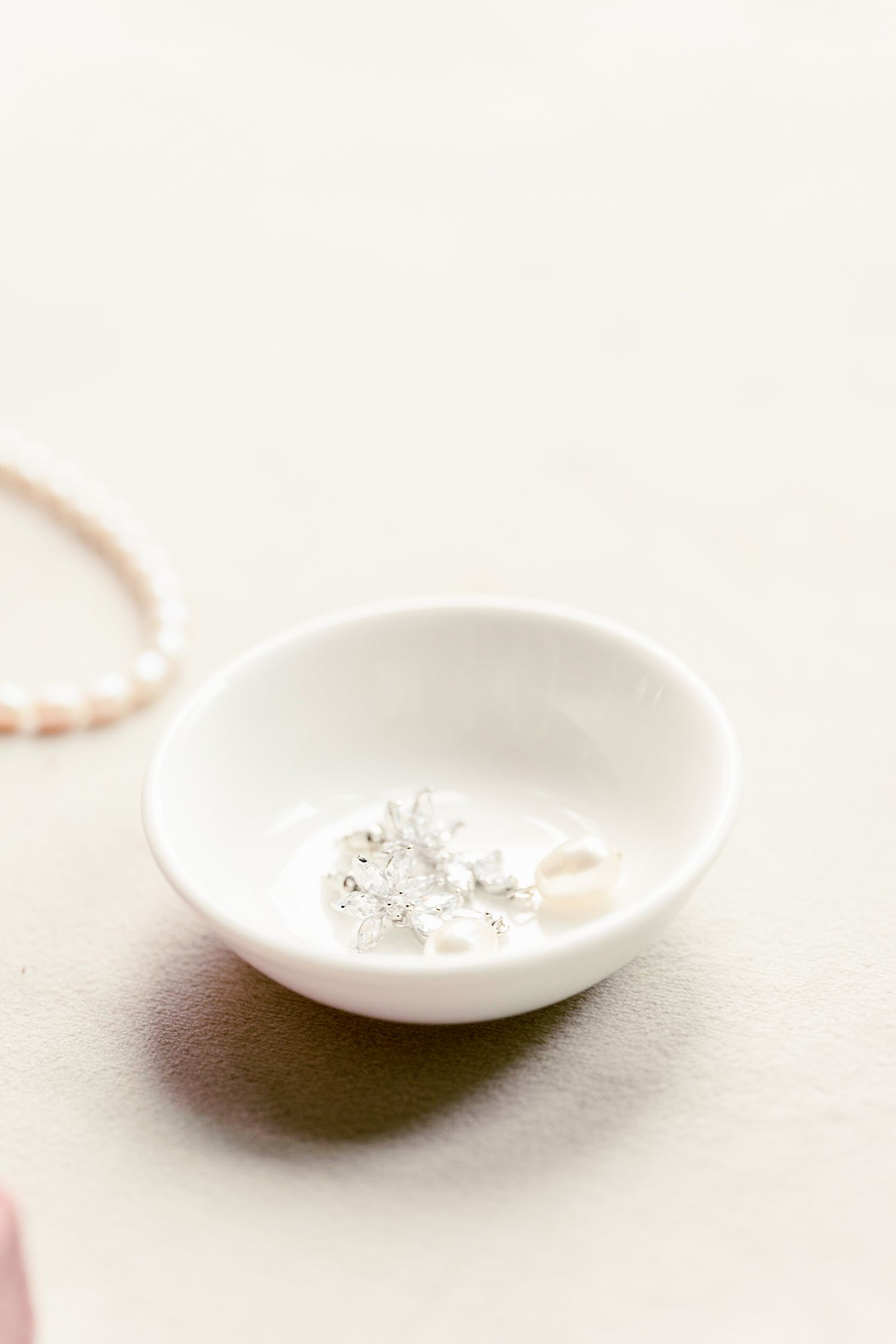 Small white ceramic dish photographed against a light background.
