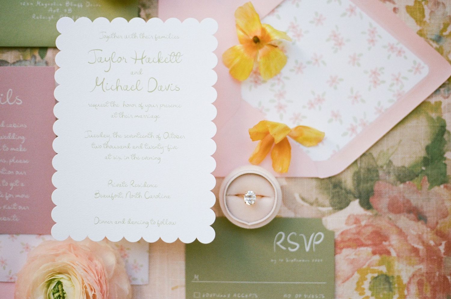 Wedding stationery suite featuring scalloped invitations with yellow flowers and wooden button details.