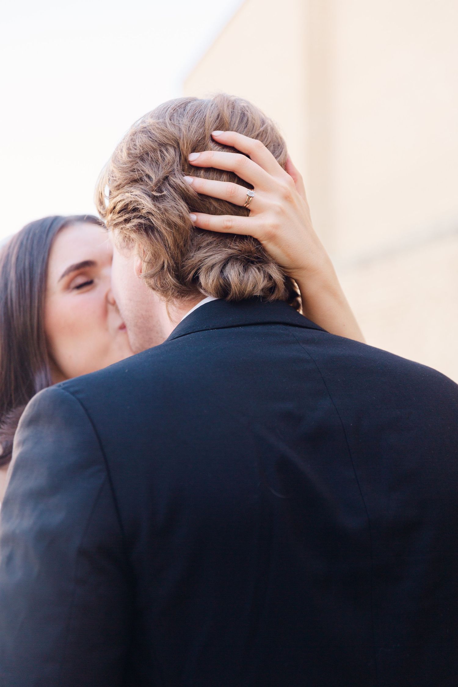 An intimate moment captured between newlyweds during their wedding photoshoot.