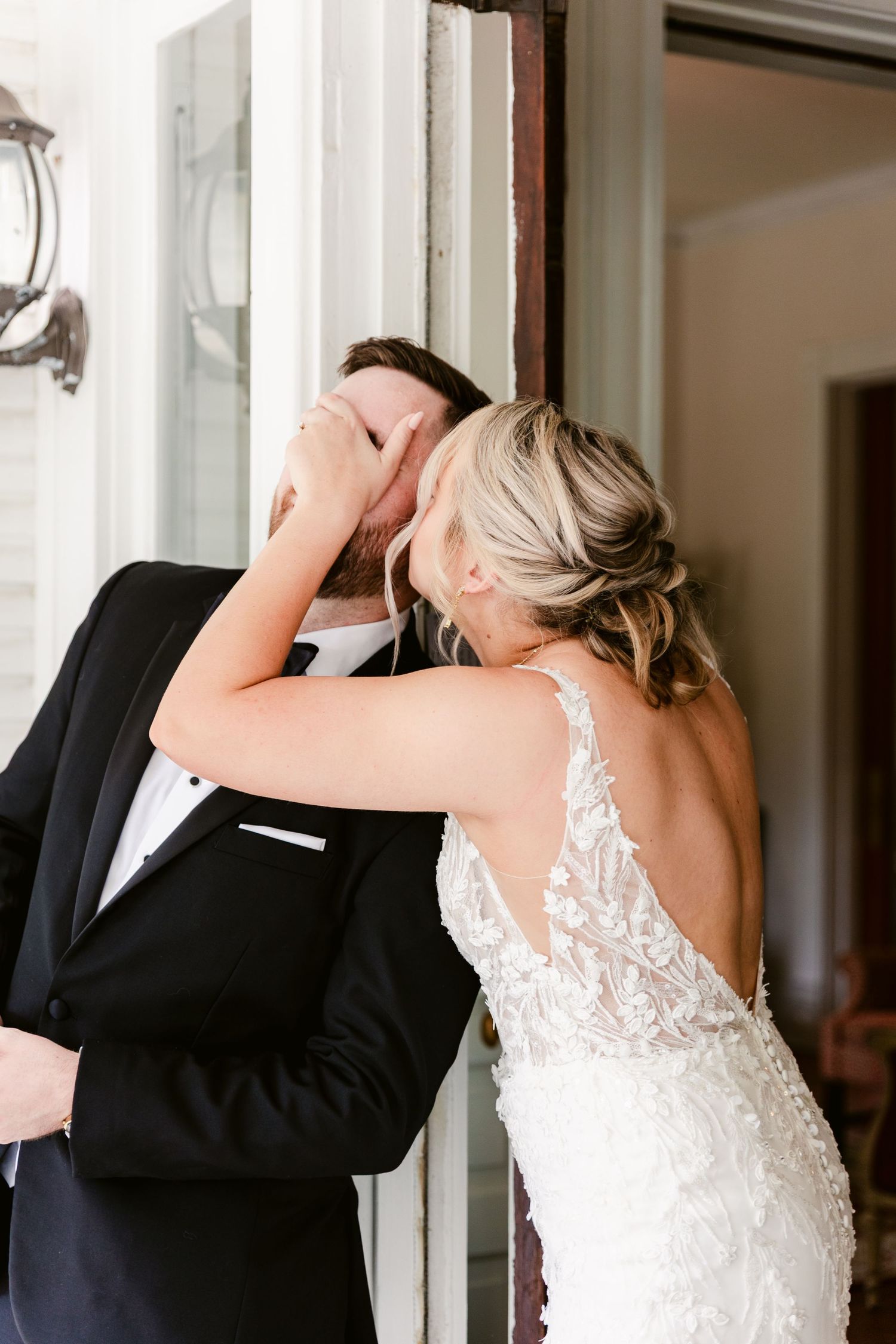 A bride and groom share a romantic dance together during their wedding celebration.