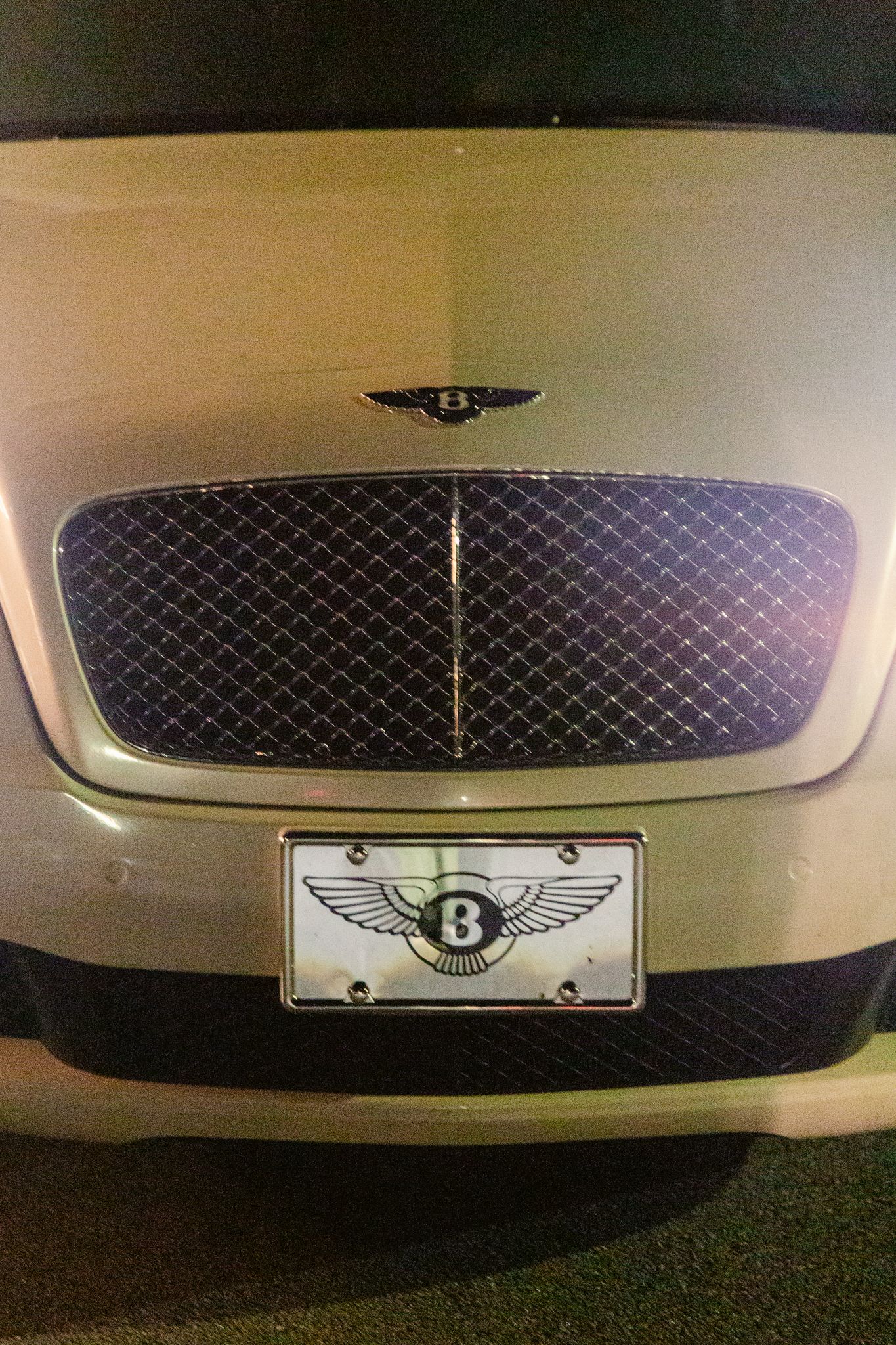 Close-up shots of Bentley car grilles and emblems in a sequence showing different angles and lighting.