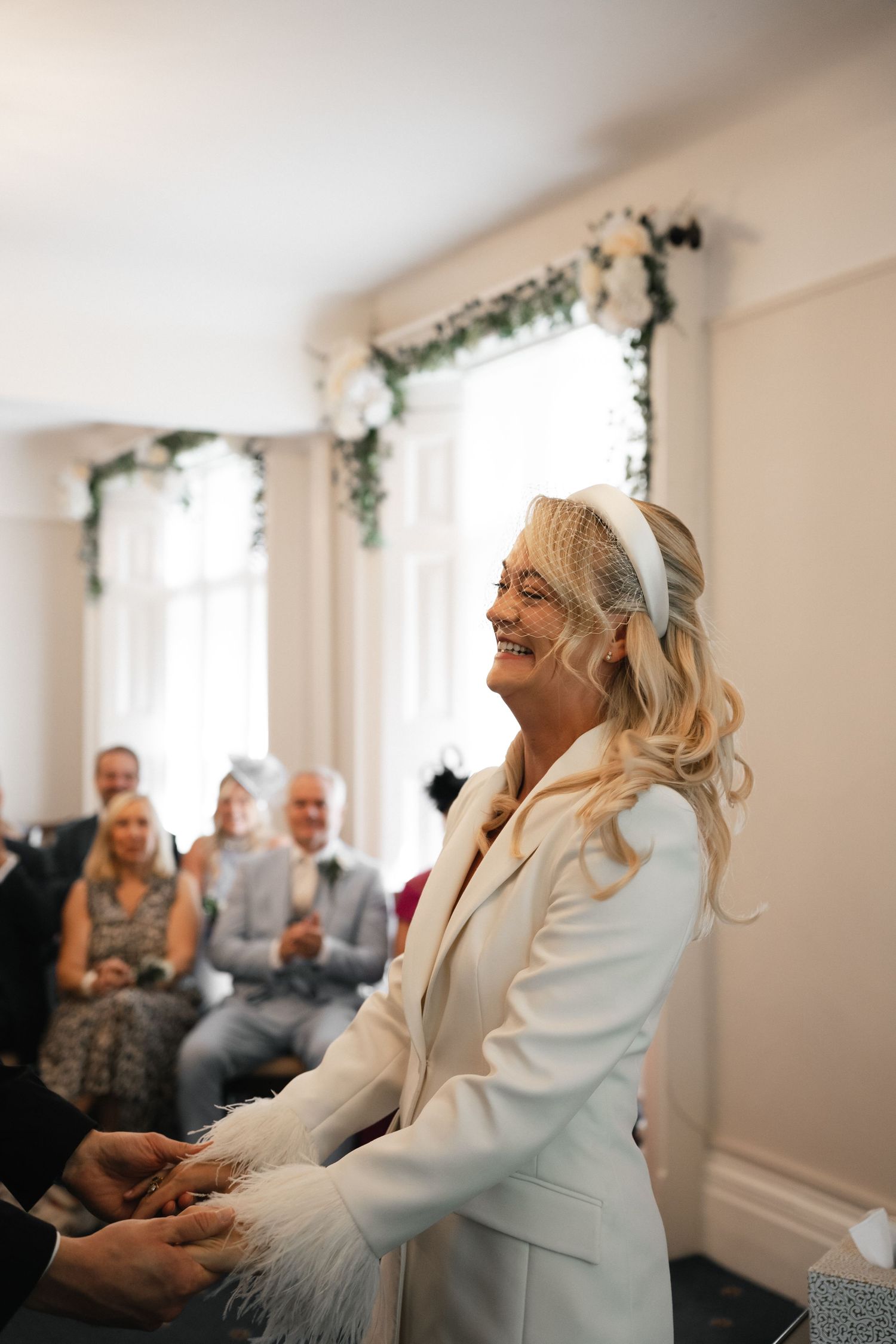 Happy moments at the alter. Birdcage veil