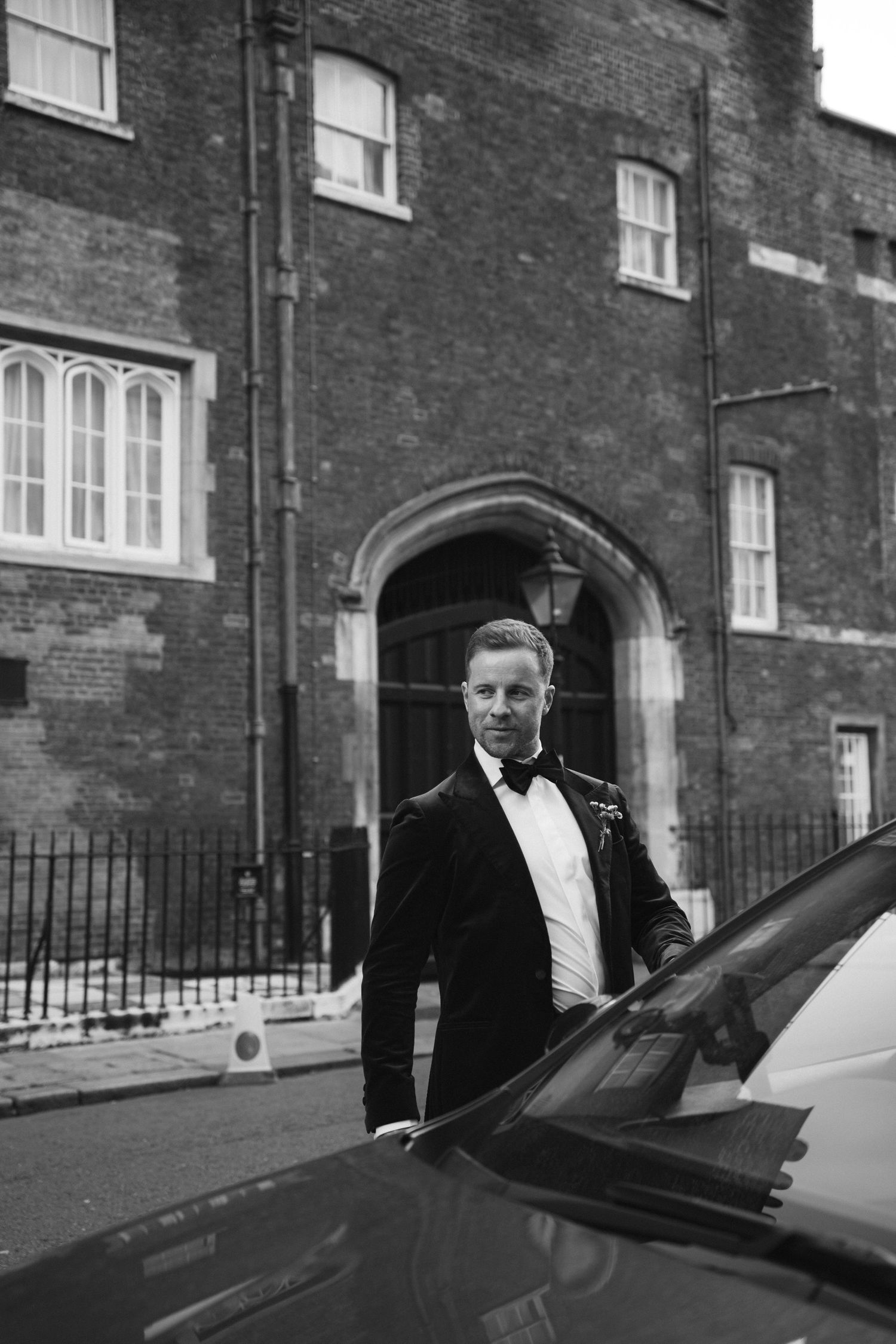 Groom getting into taxi