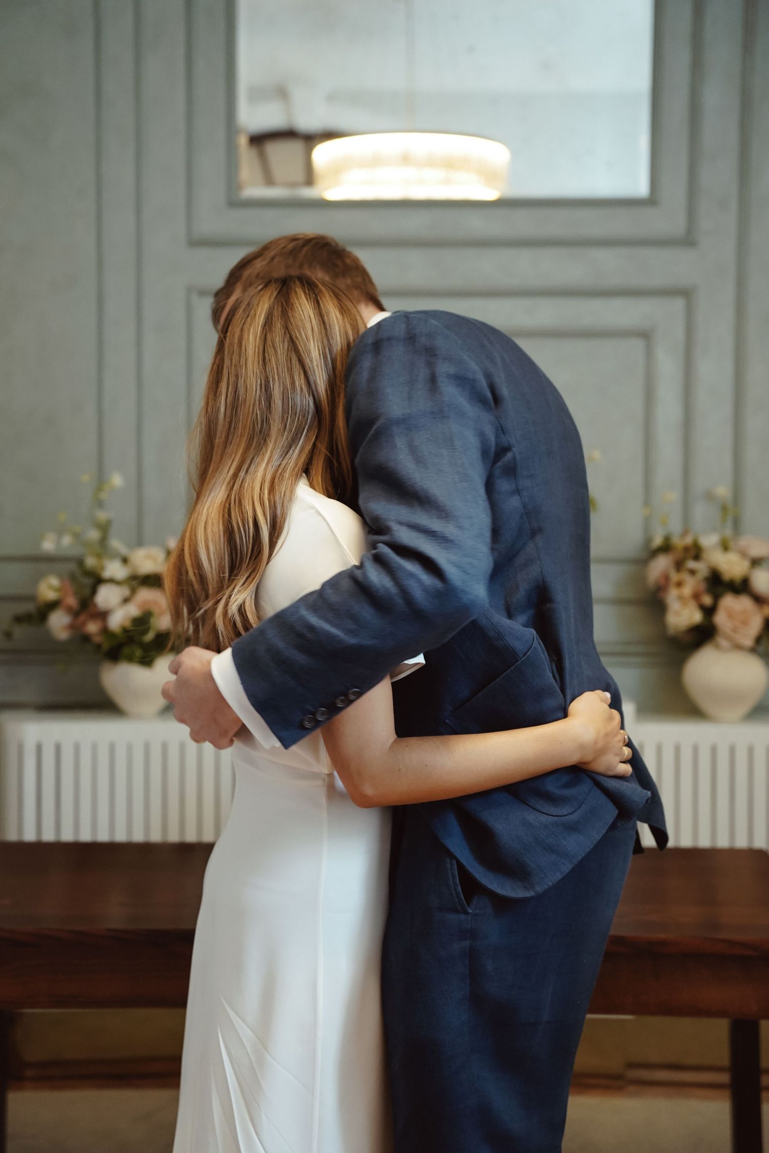 Hugging at alter