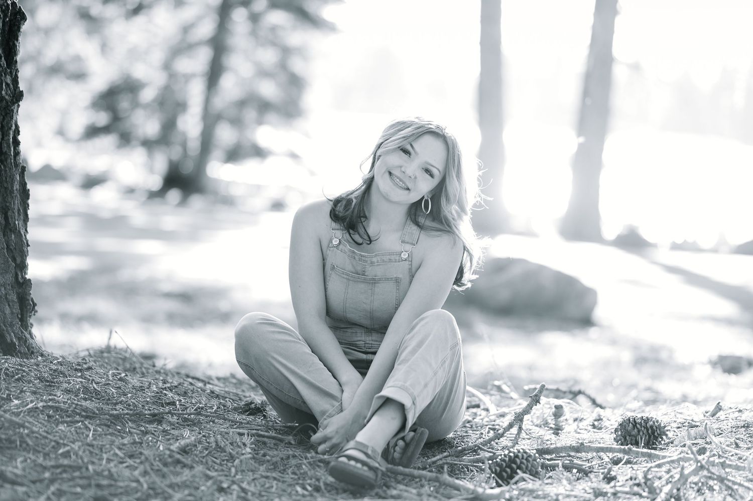 A collection of black and white outdoor portraits showing a relaxed lifestyle photoshoot in a natural setting.