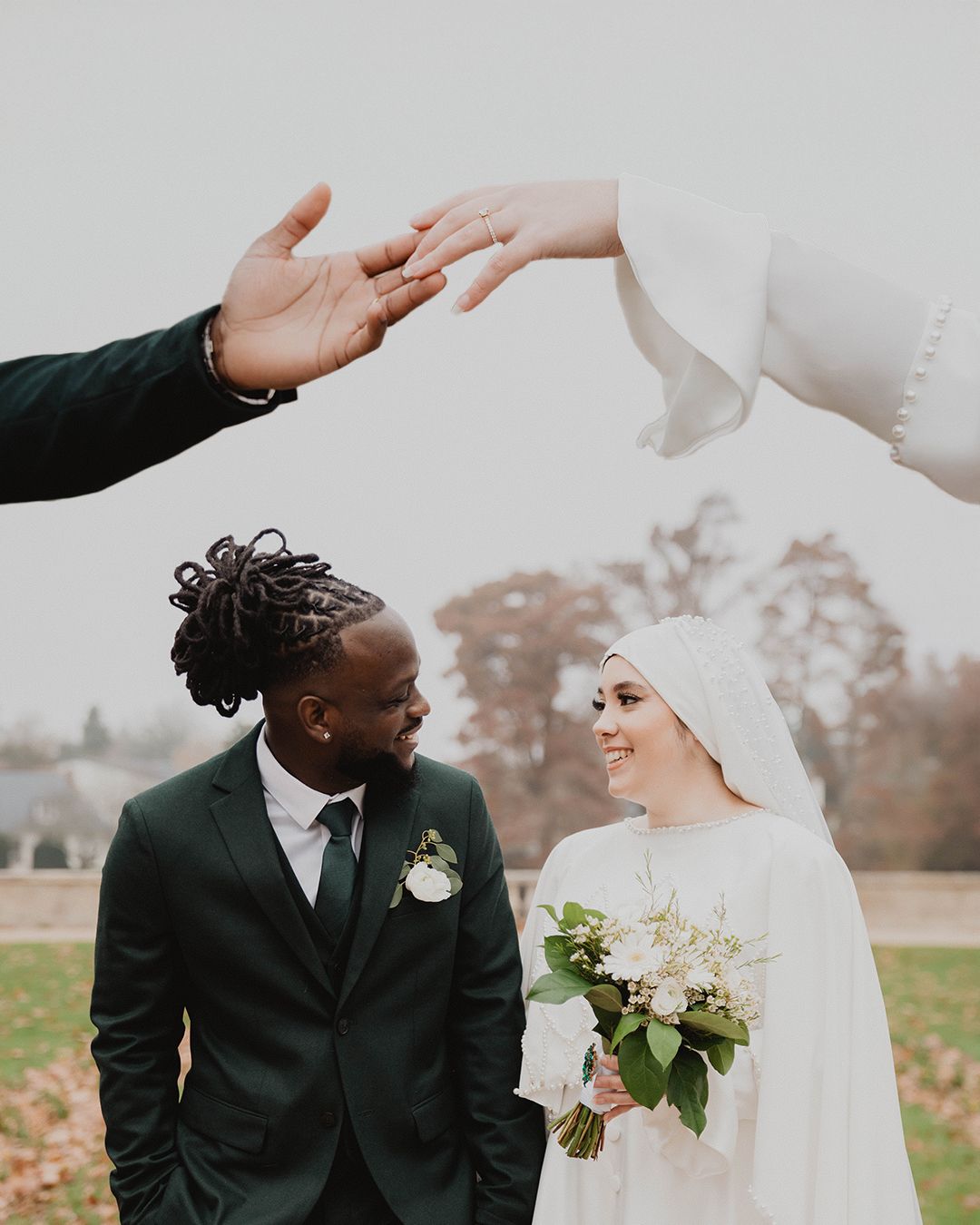 Intimate wedding portraits showing tender moments between bride and groom in outdoor setting.