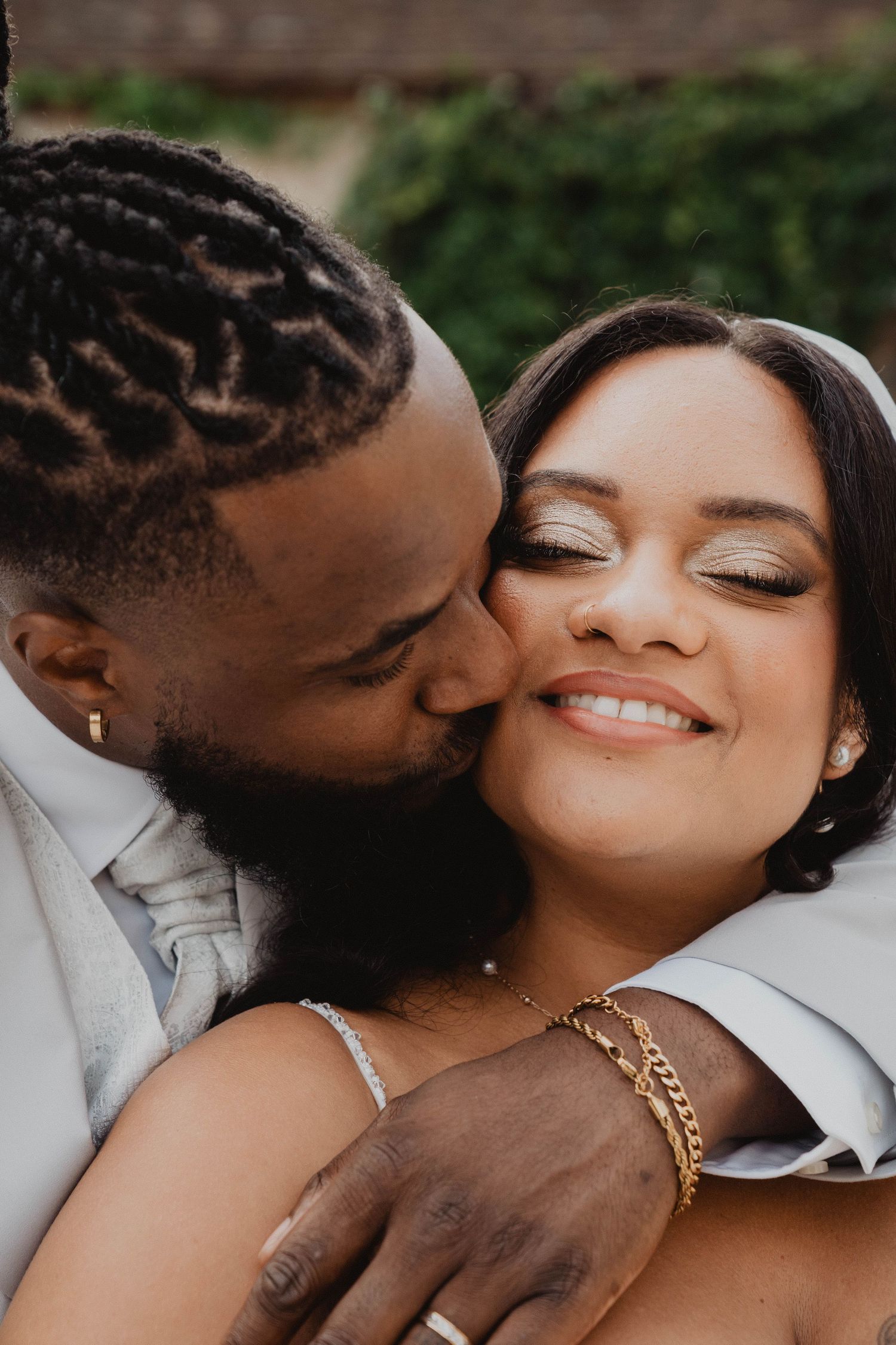 Close-up romantic portrait showing tender affection between partners.