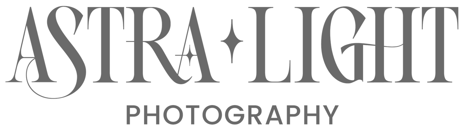 Elegant monochromatic photography logo design with the text Astral Light in stylized lettering.