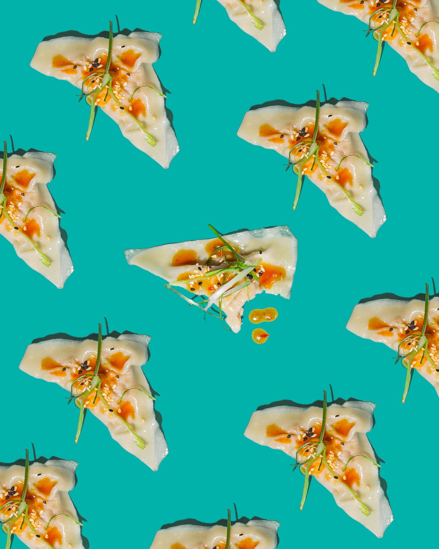 Artistic arrangement of appetizers with garnish on turquoise background in repeating pattern.
