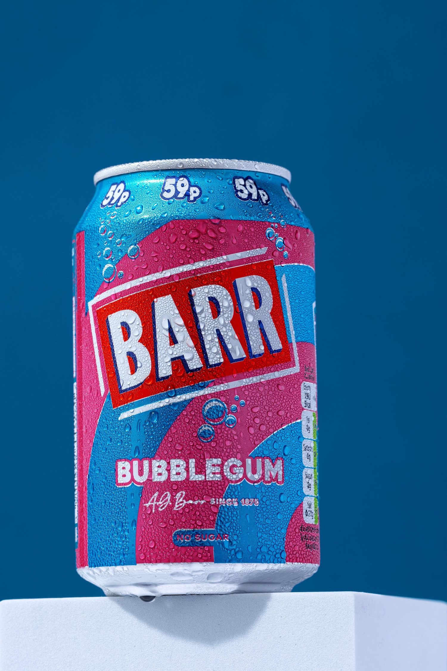 A can of Barr bubblegum flavored soda with condensation droplets against a blue background.