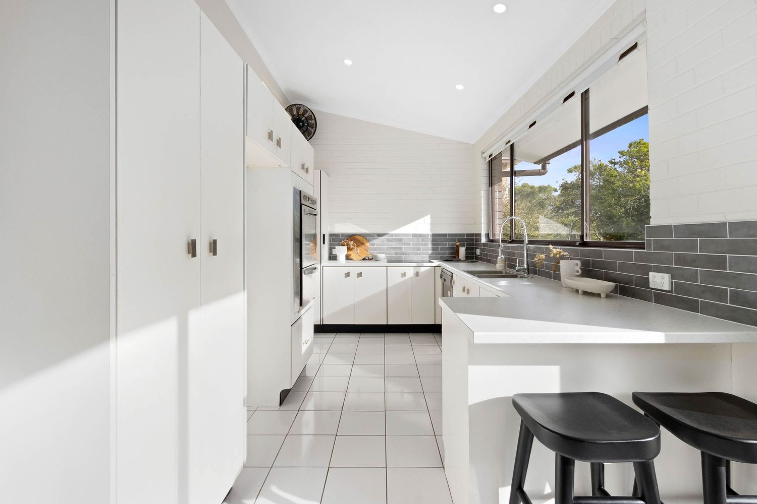 Real estate photography of a Sydney kitchen with stunning natural light