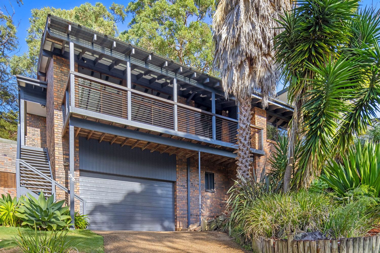 Real estate photography of a Sydney home with a bushland view