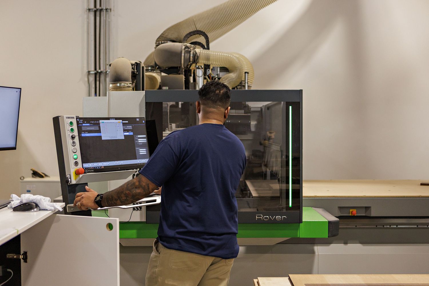 Student working at a laboratory bench performs testing and analysis in a research facility.