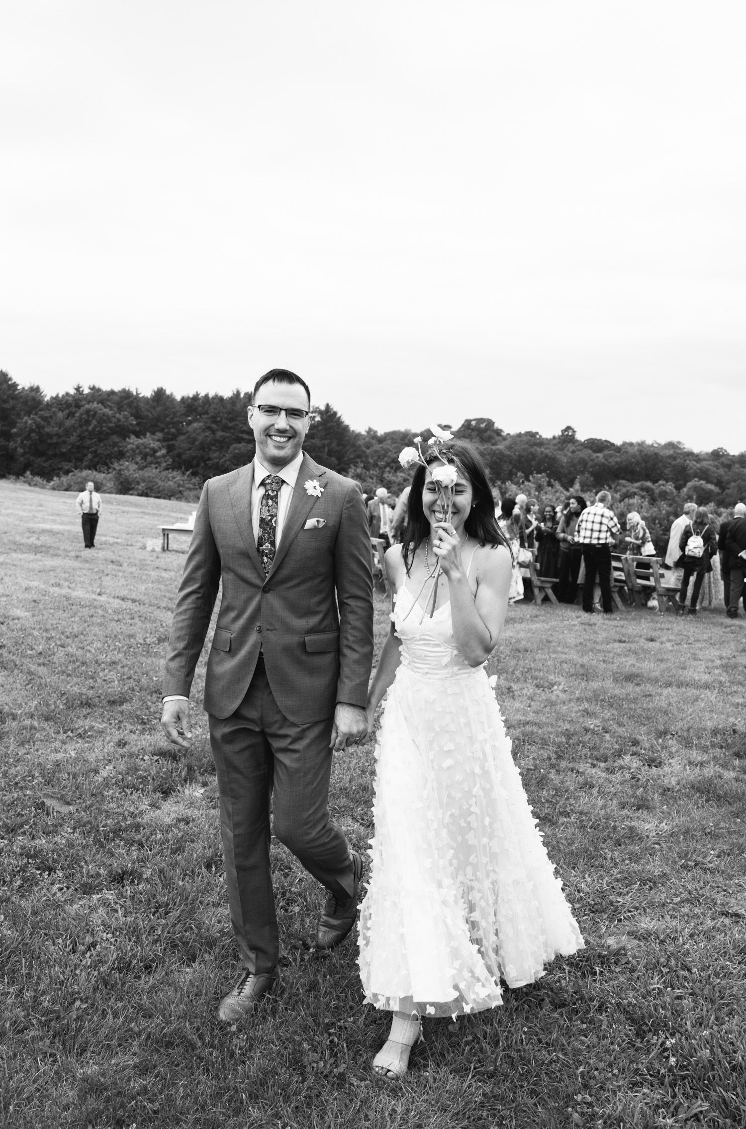 Bride and groom celebrate after their ceremony at Rose Hill Farm wedding