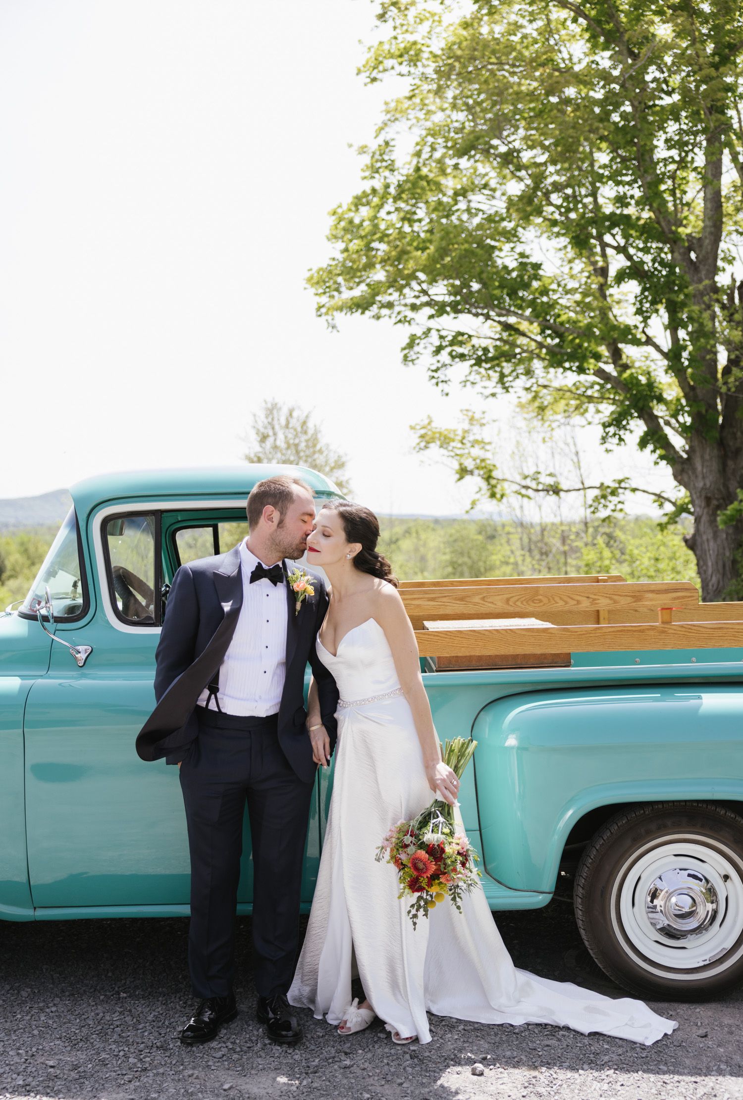 Couple sharing a kiss at Windham Manor wedding