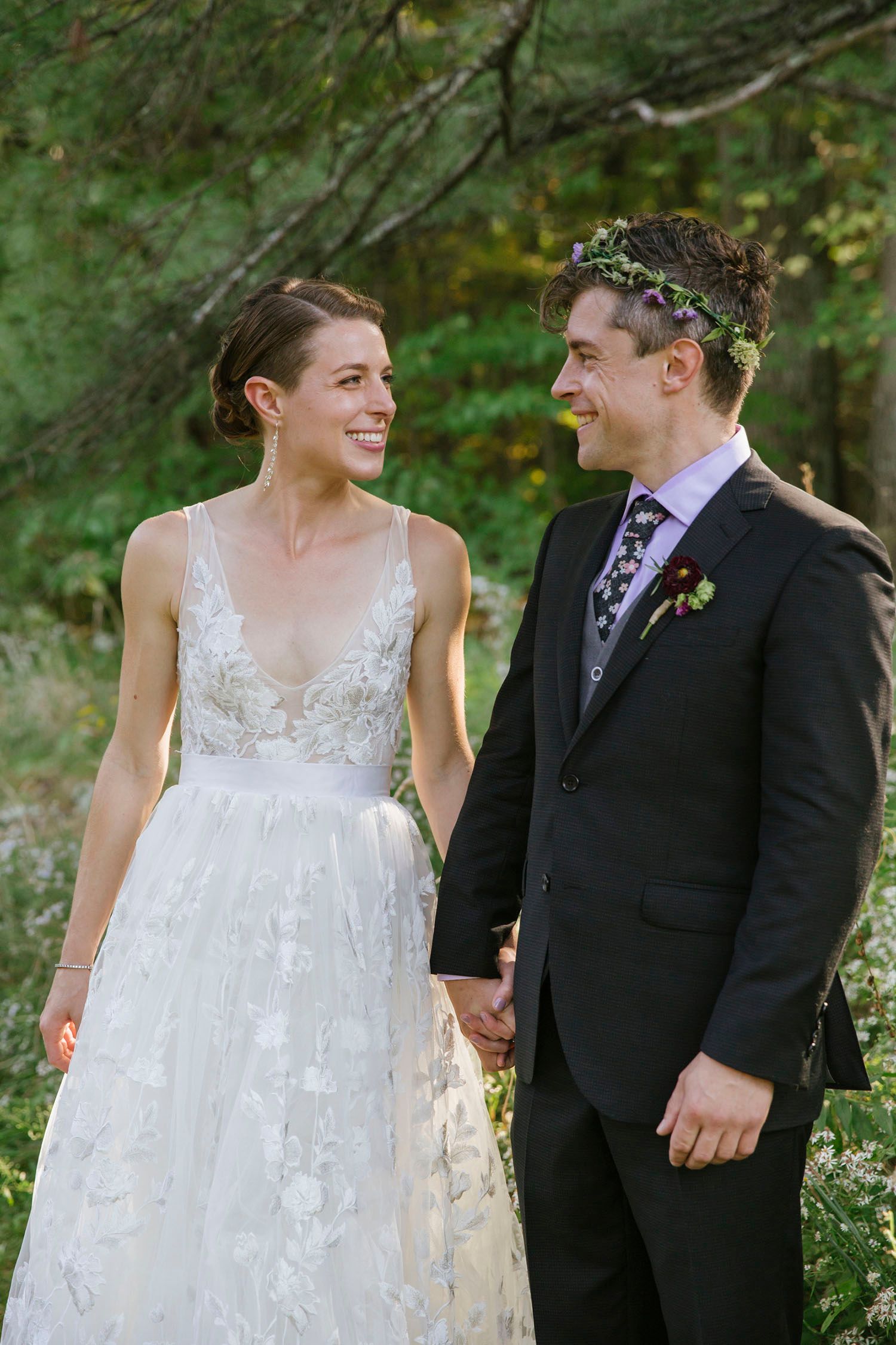 Couple smiling at each other at their Snow Farm wedding