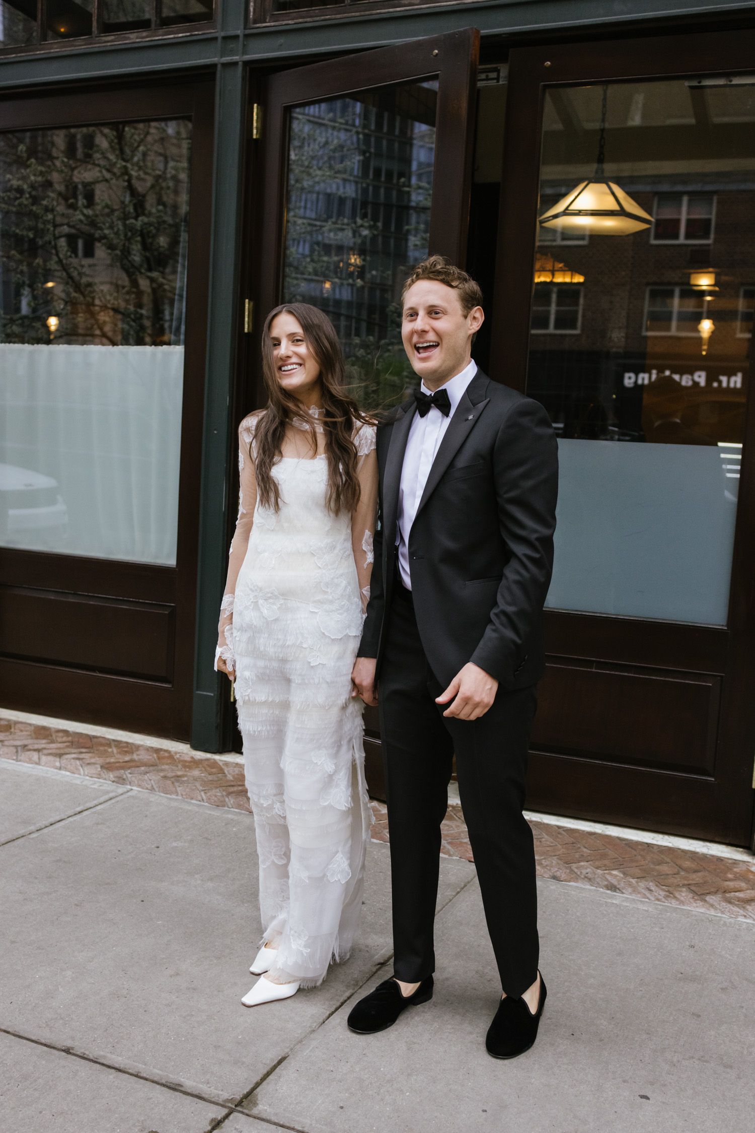 Couple laughing on a street in NYC