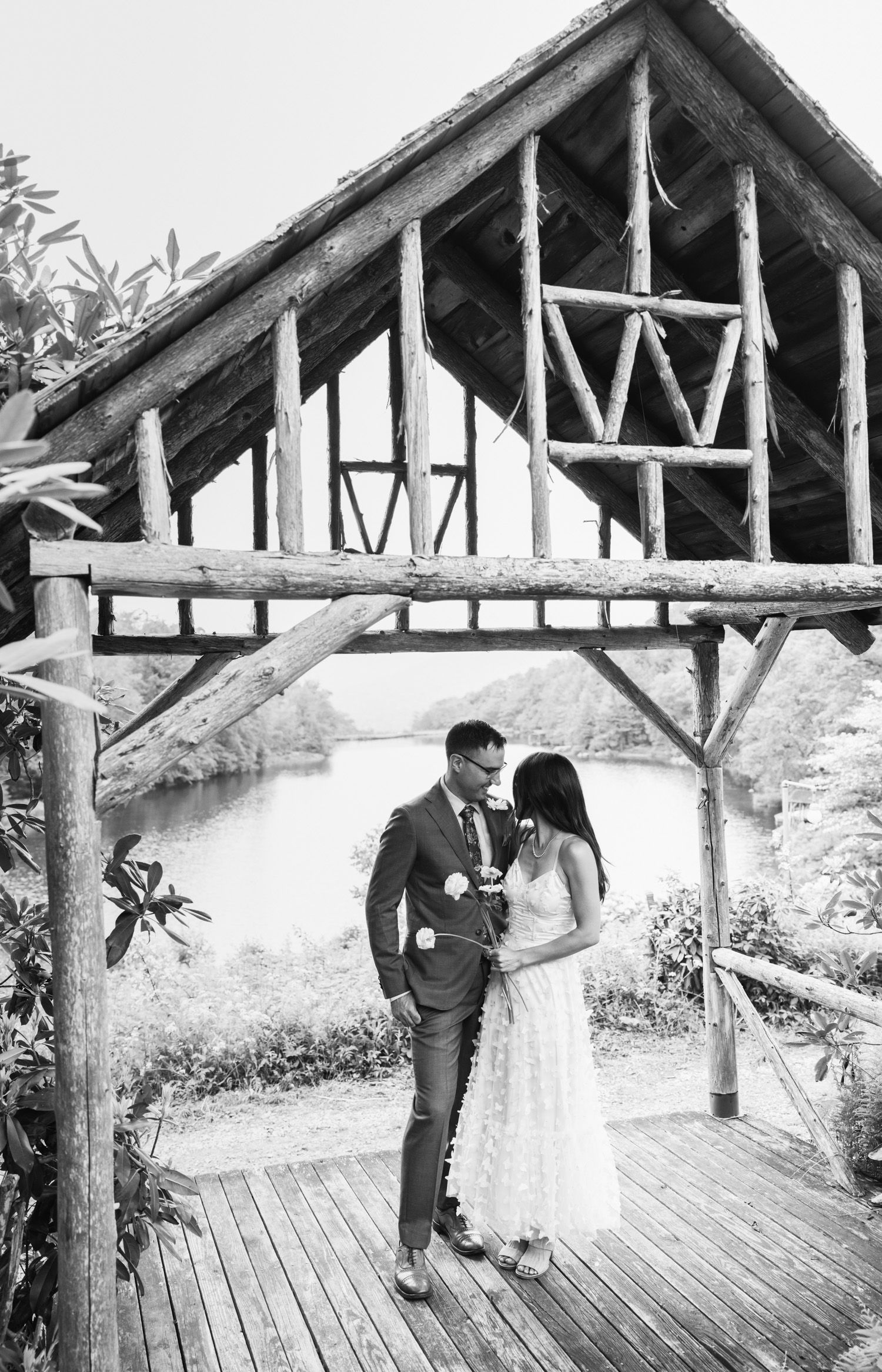 Couple embracing at home before their wedding in the Hudson Valley at Rose Hill Farm