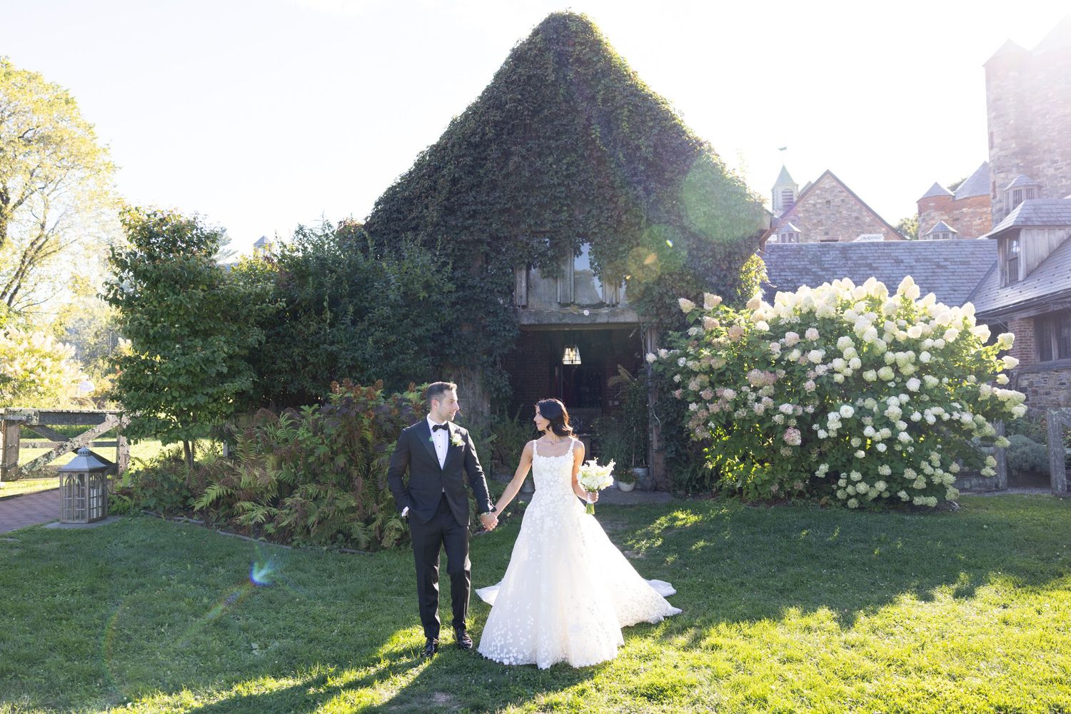 A couple holding hands at Blue Hill at Stone Barns wedding