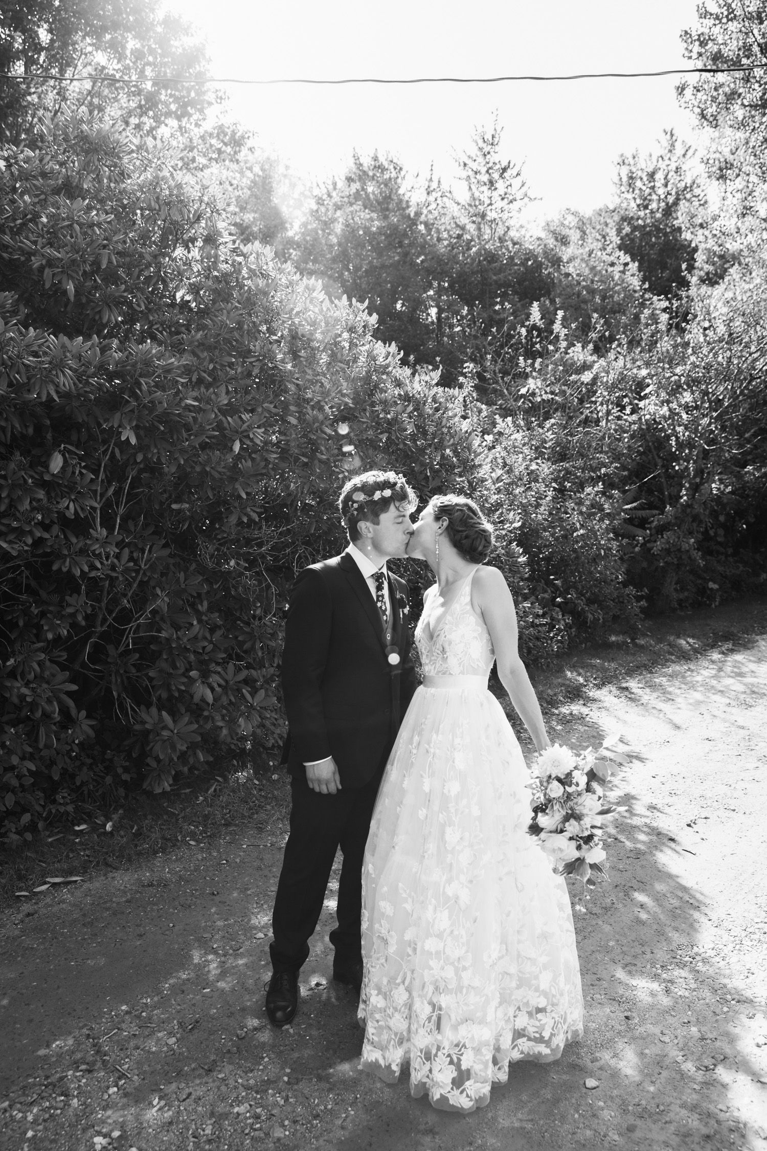 A couple kissing at Snow Farm wedding