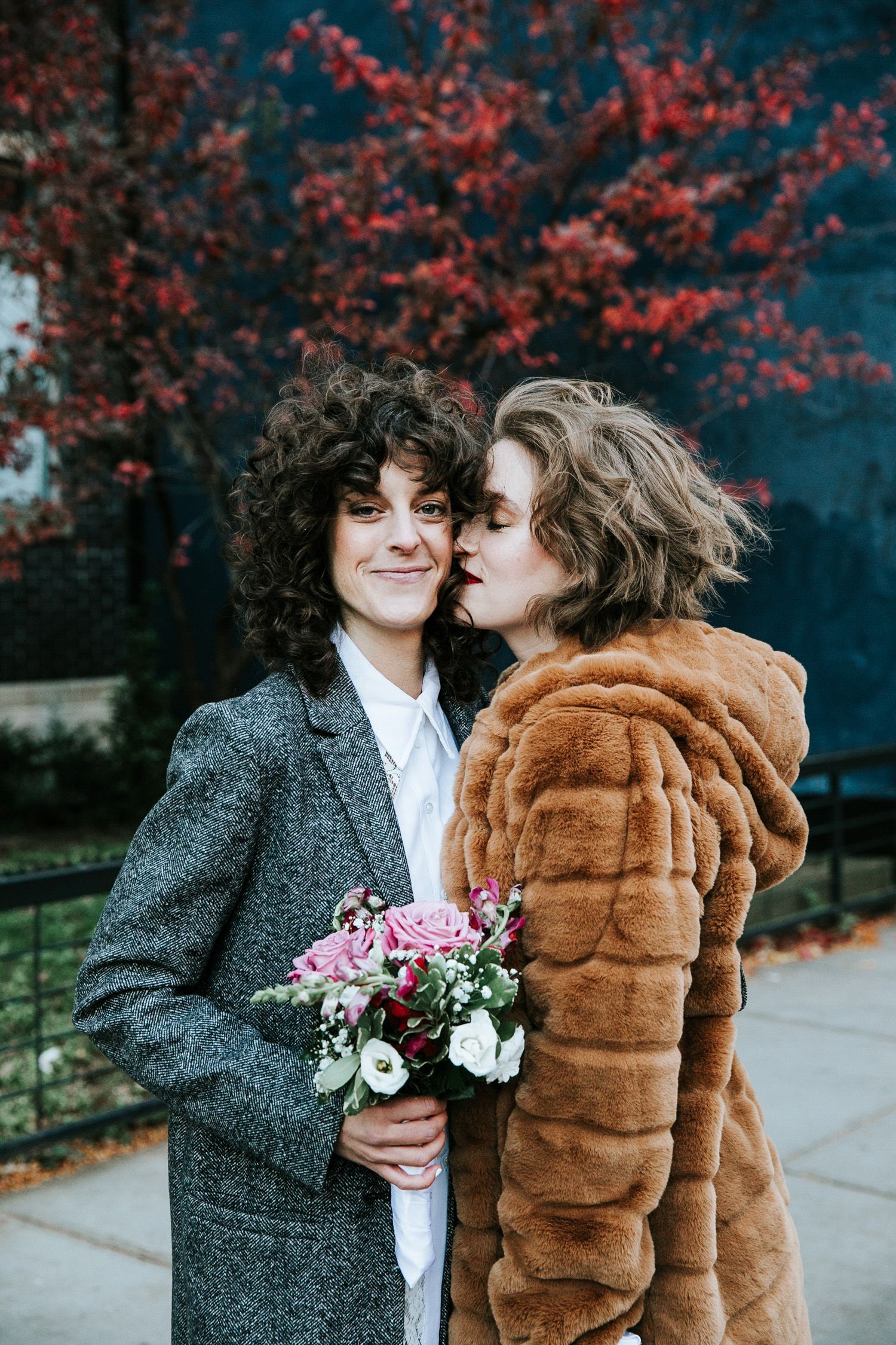 Couple embracing on a street in Williamsburg Brooklyn