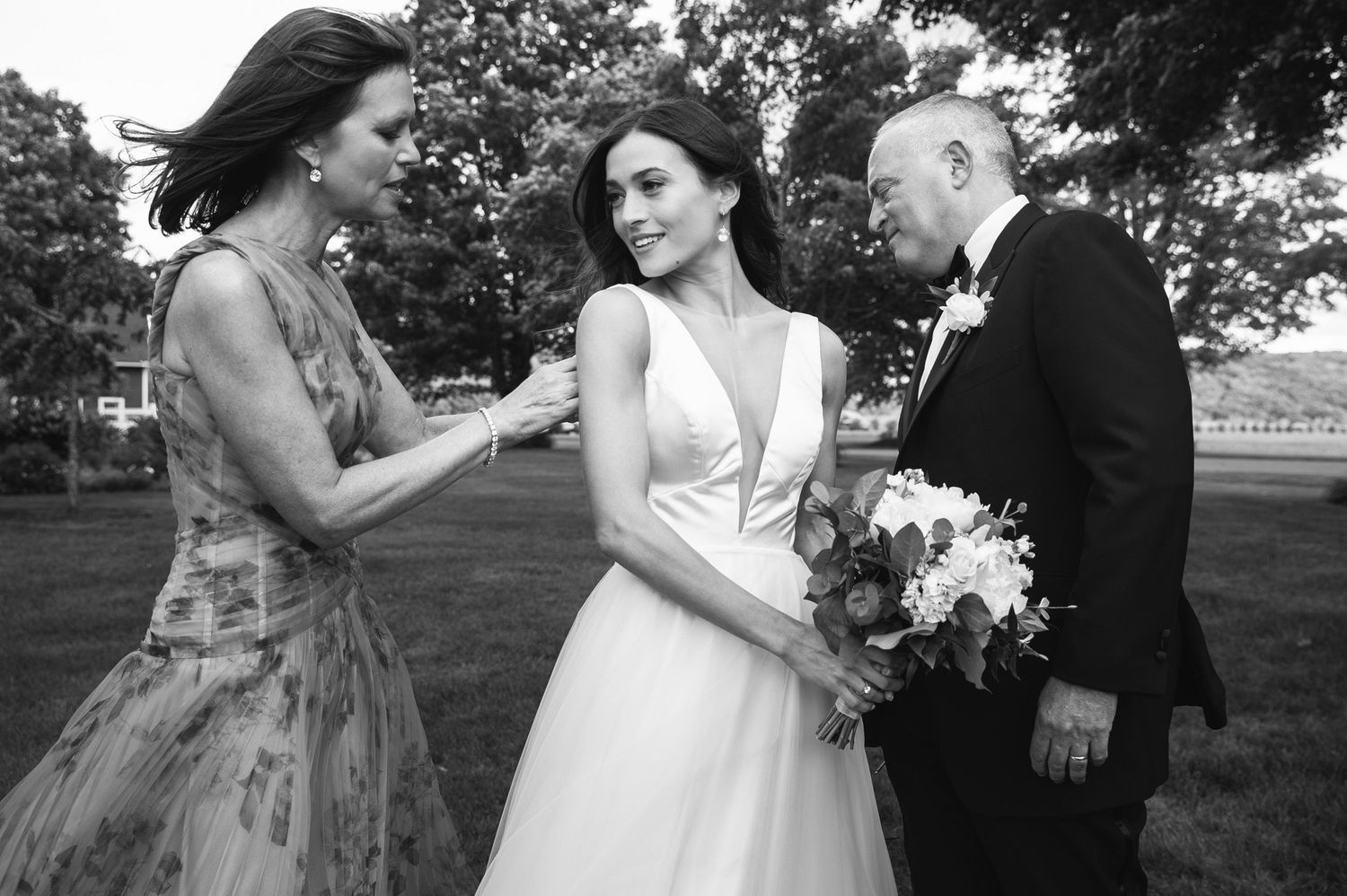 Bride with parents at LionRock Farm wedding