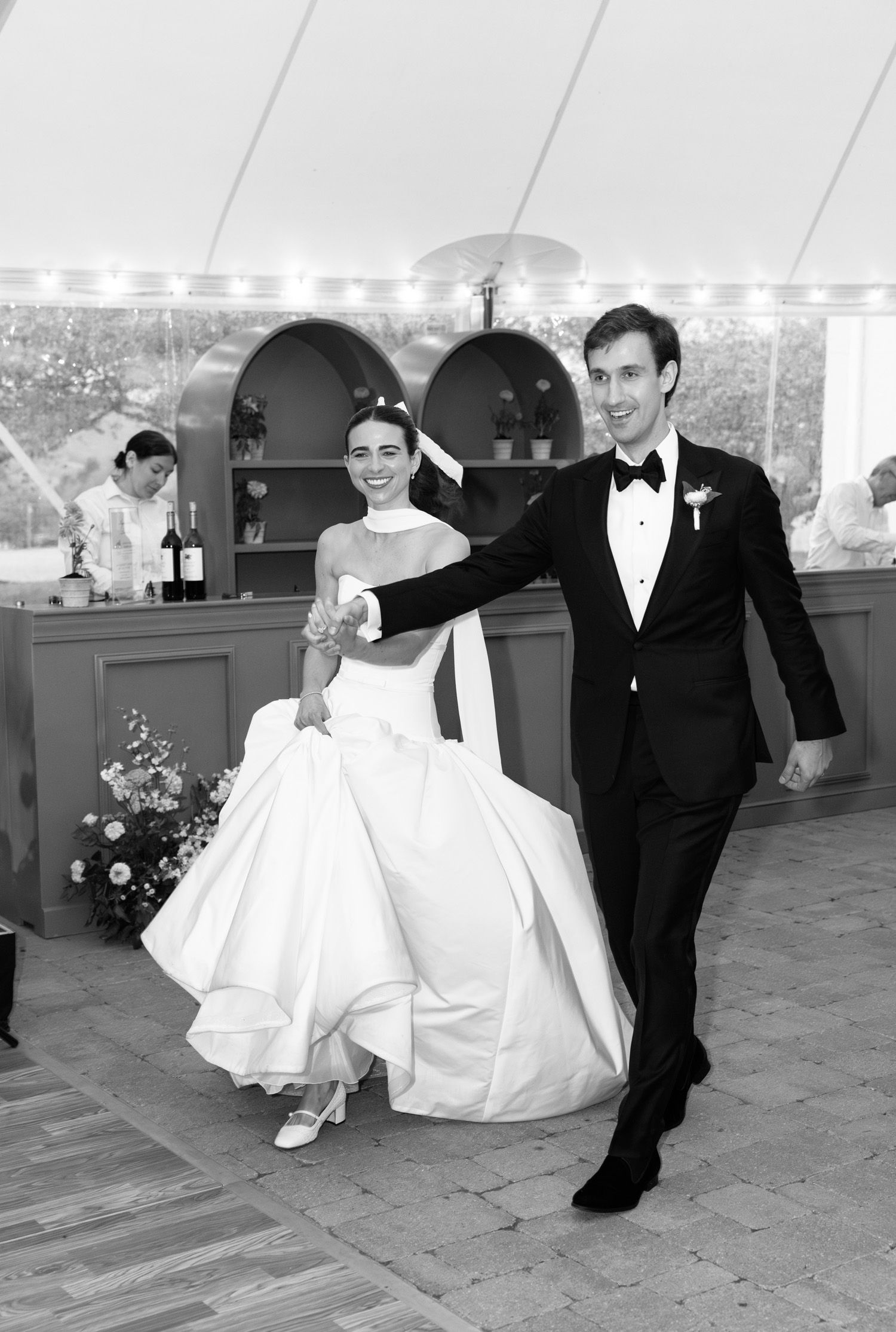 Couple entering their reception at LionRock Farm wedding