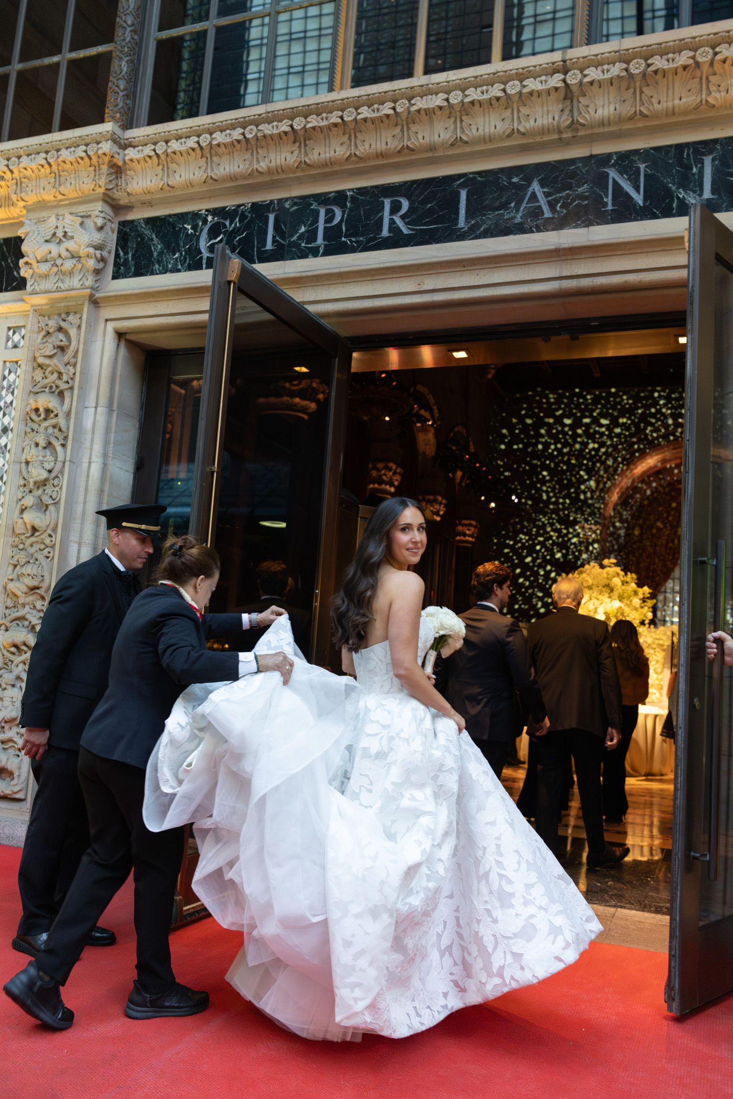 Bride entering Cipriani 42 for her wedding in NYC