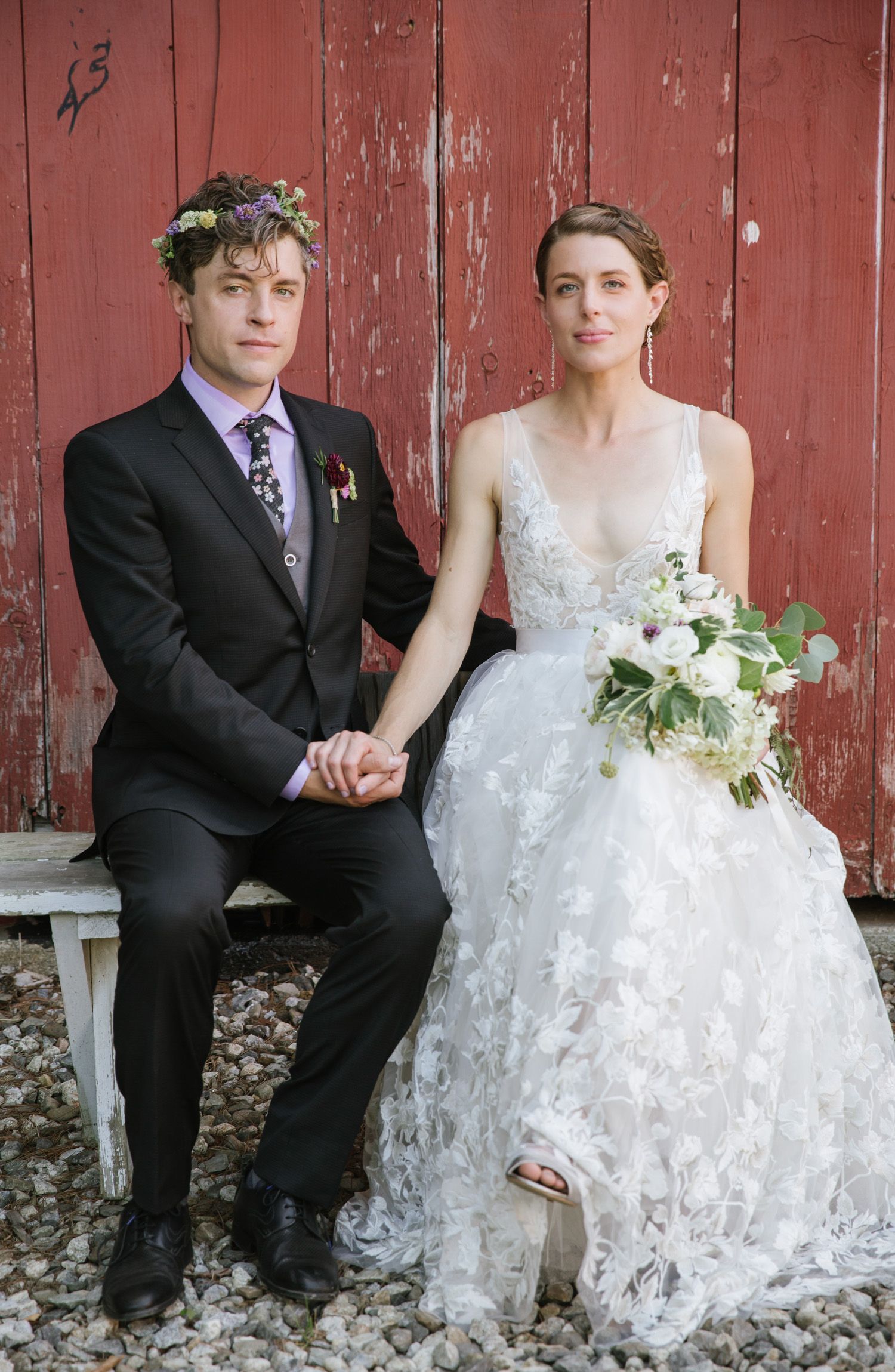 Bride and groom holding hands at Snow Farm wedding
