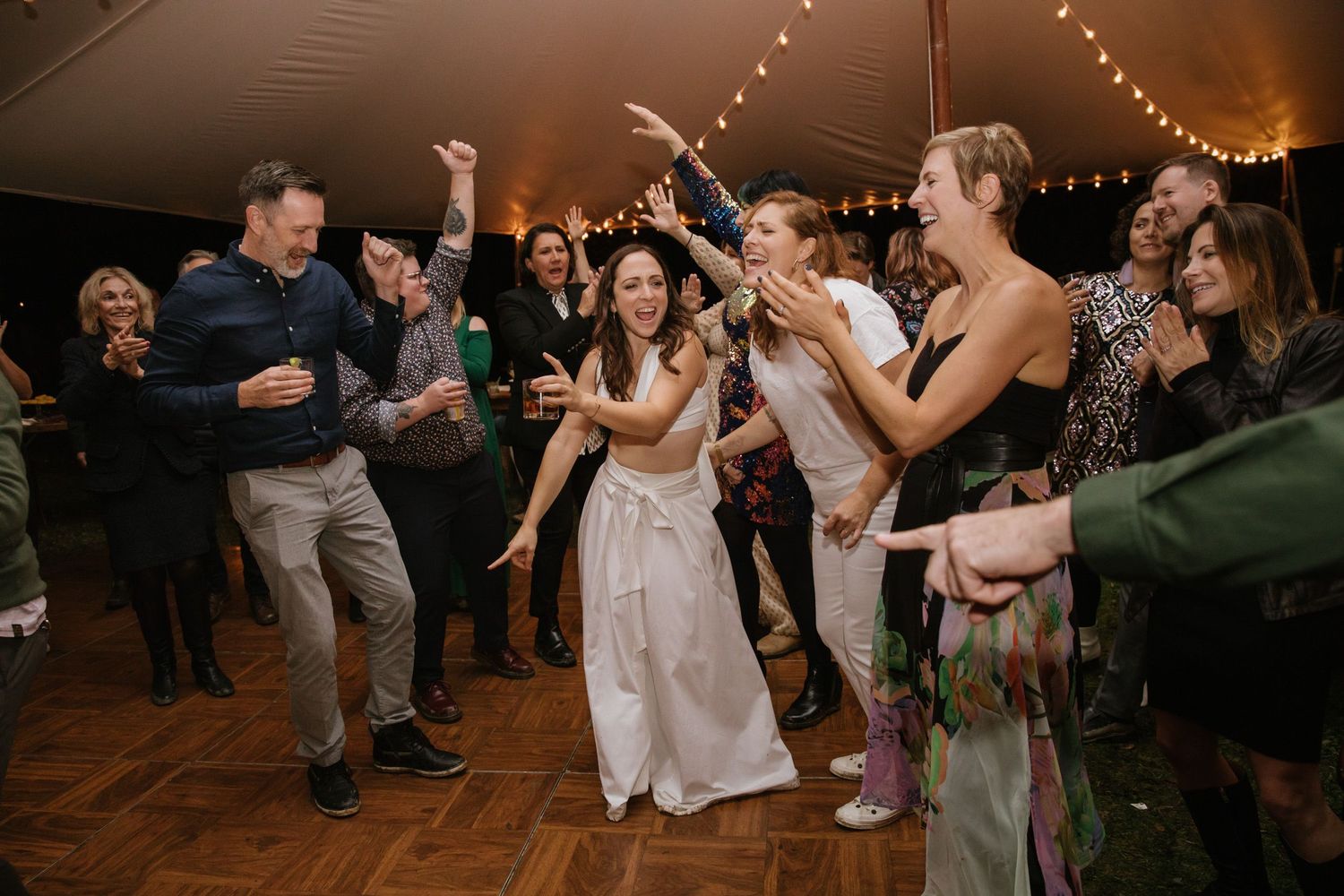 Couple and their guests dancing at a wedding reception in the Hudson Valley