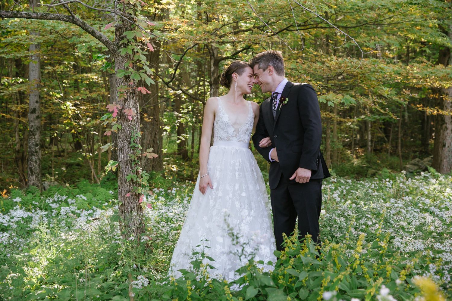 Couple embracing at Snow Farm wedding