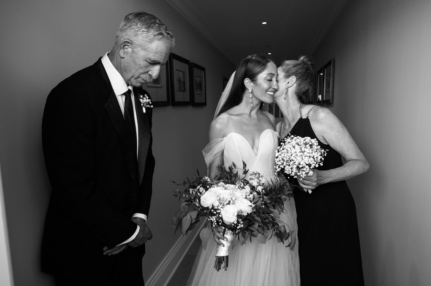 Bride talking with her parents before her wedding at Ocean House in Rhode Island